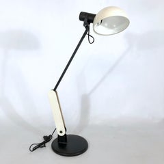 Harvey Guzzini articulated white table lamp from 70s