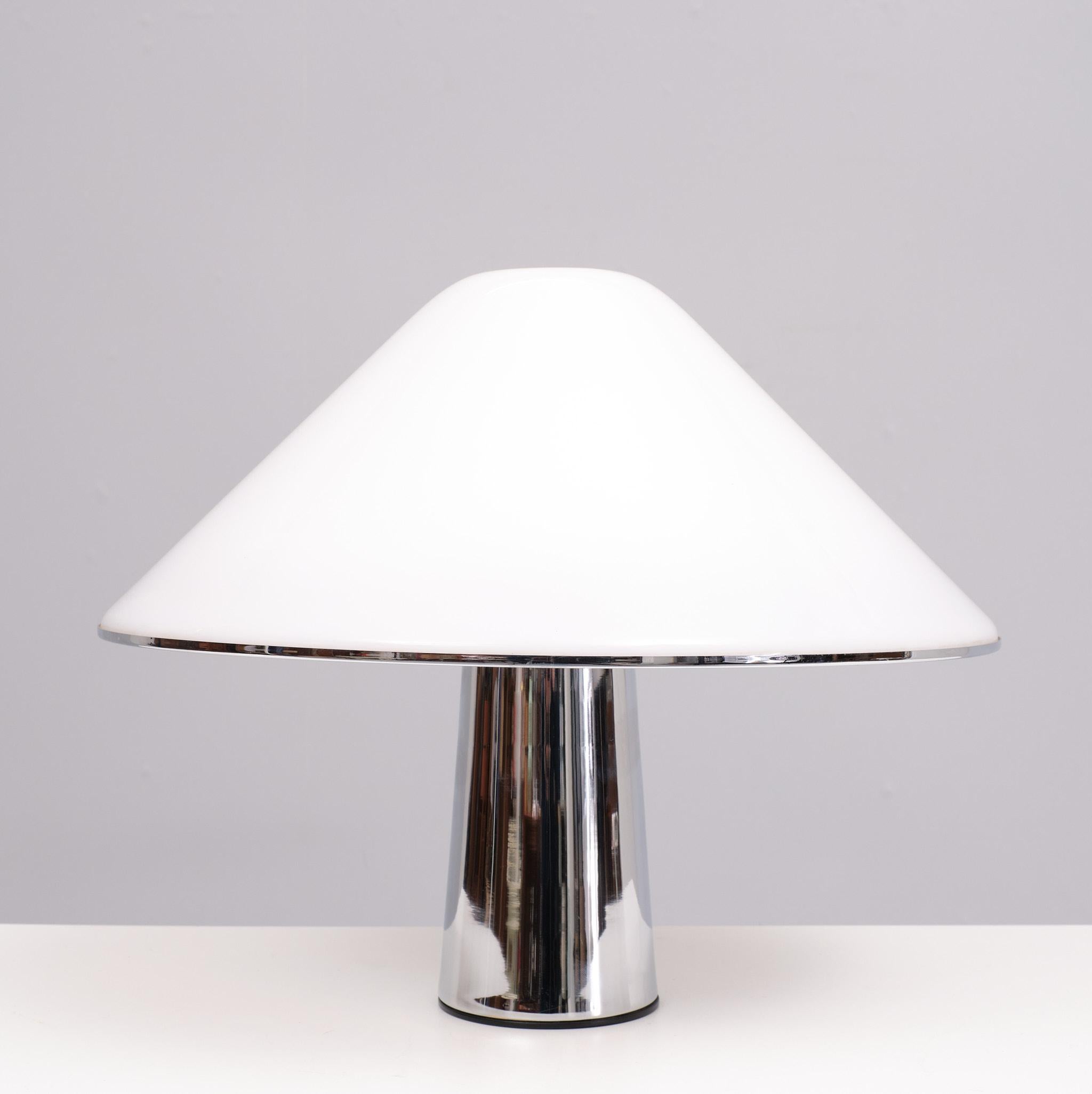 Beautiful iconic mushroom table lamp by Harvey Guzzini . model 