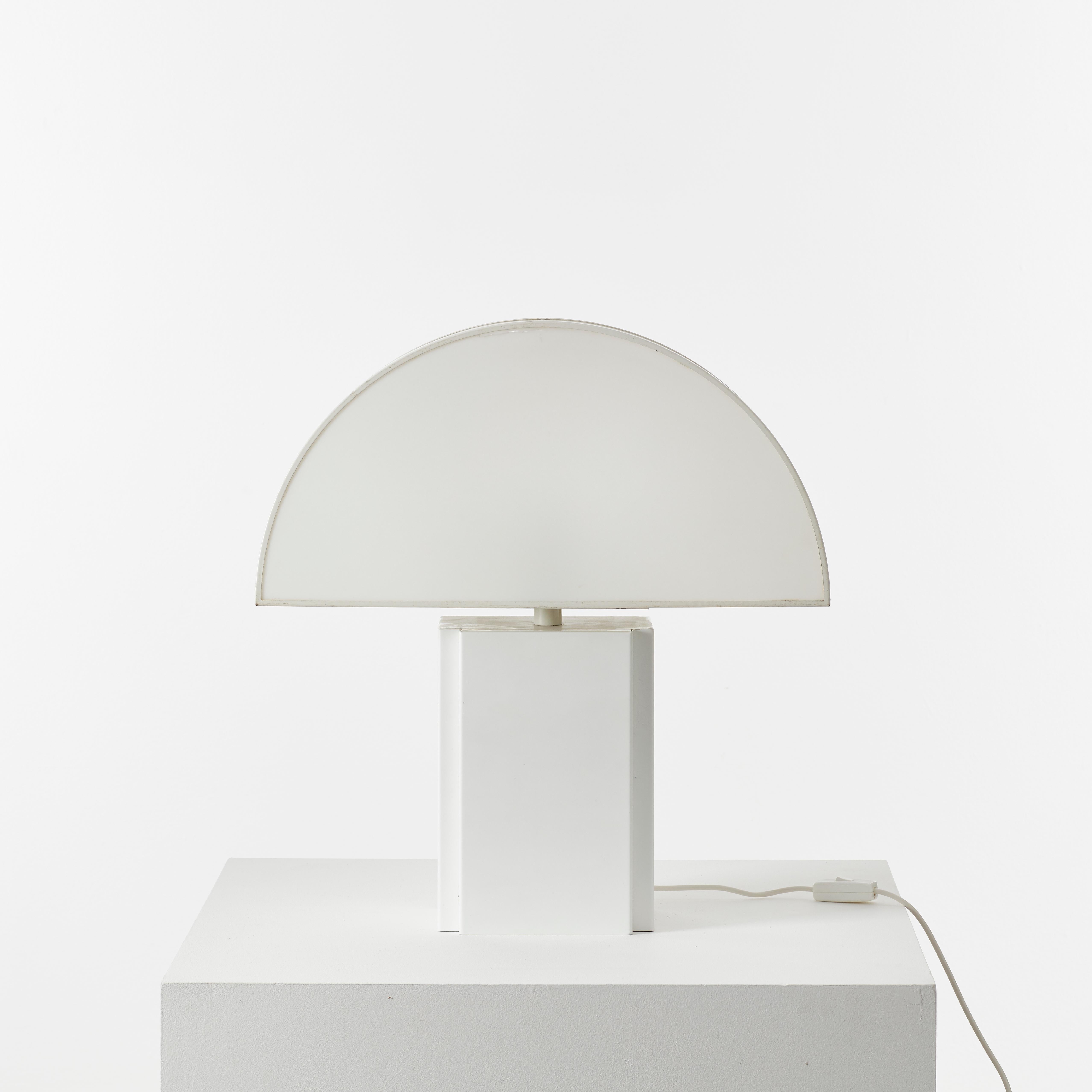 Large Olympe table lamp designed by Harvey Guzzini for ED, Italy 1970s. The demi-lune shade is particularly pleasing lit, a half moon of ambient light through semi-opaque acrylic. It has a metal base and a plastic shade, open at the back for ease of