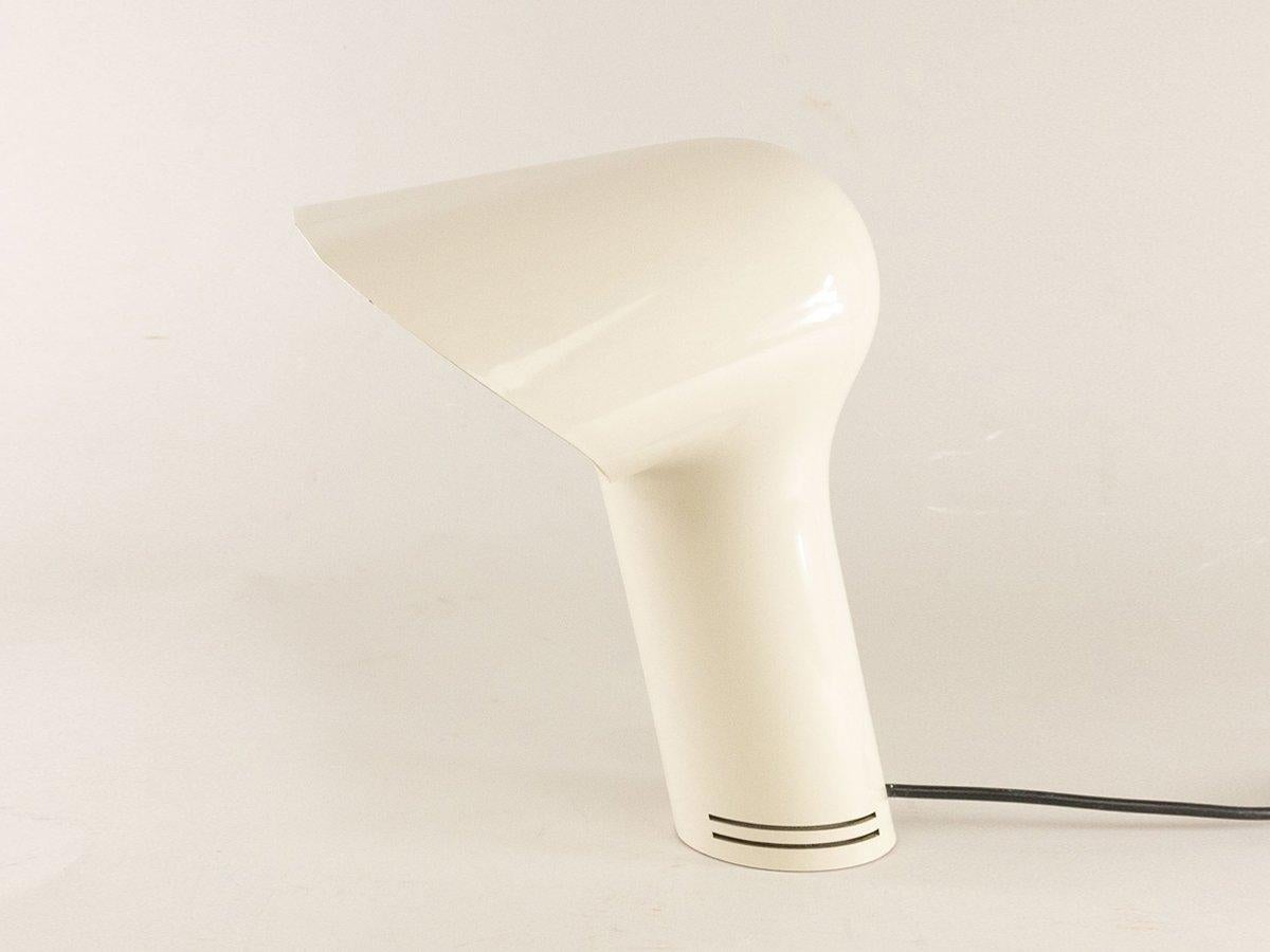 A very rare piece produced by Harvey Guzzini in 1971. The lamp is made of molded ABS plastic and has a cast iron in the base used as a counterbalance. It is in very good vintage condition. The Sorella lamp became widely known after appearing in the