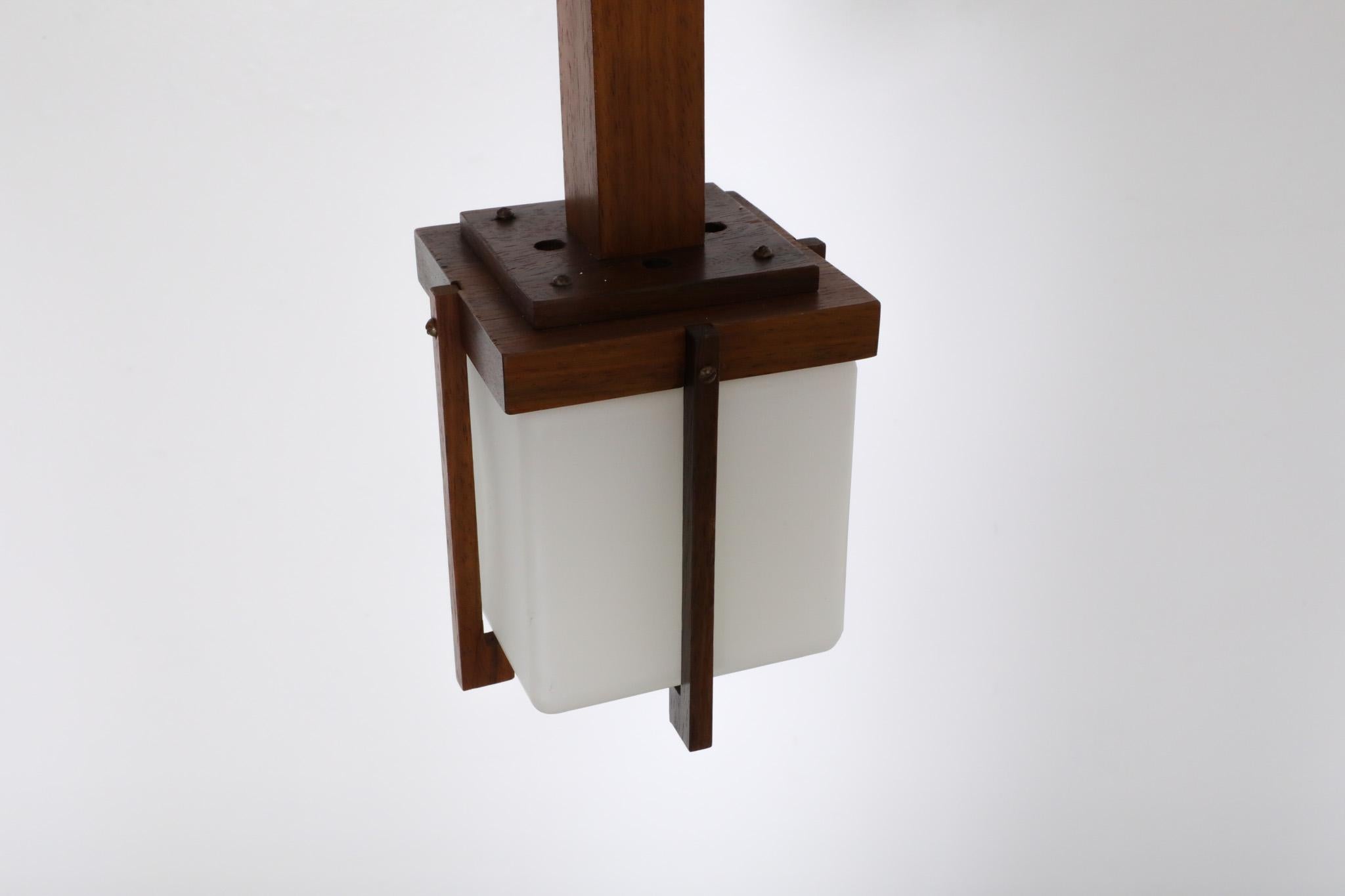 Harvey Guzzini Style Mid-Century Teak Lantern Pendant with Milk Glass Shade In Good Condition For Sale In Los Angeles, CA