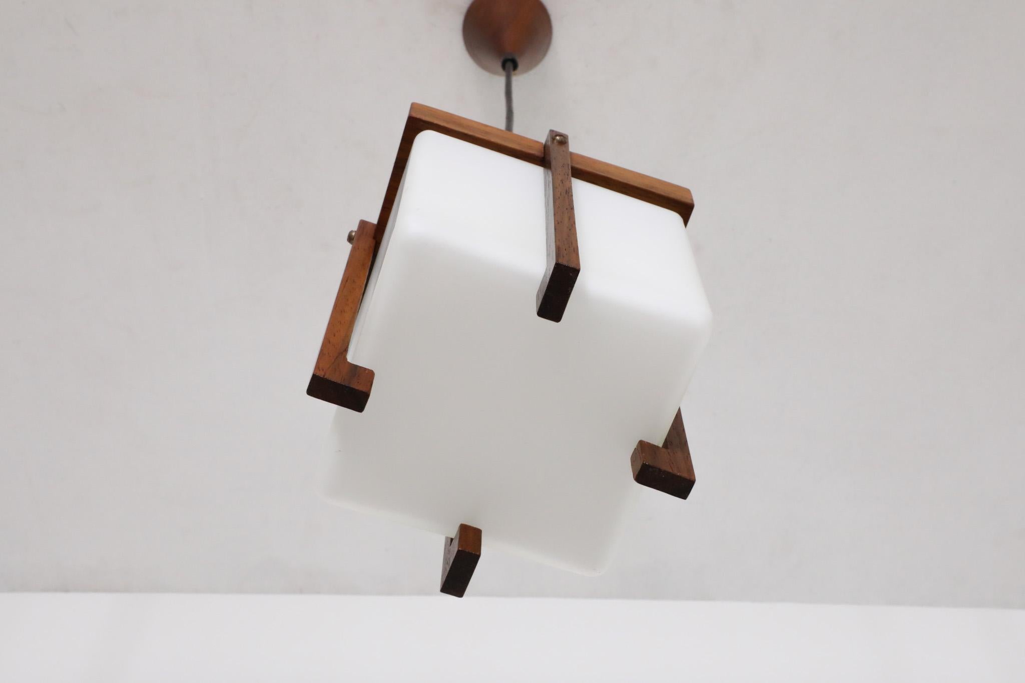 Mid-20th Century Harvey Guzzini style Mid-Century Teak Lantern Pendant with Milk Glass Shade For Sale