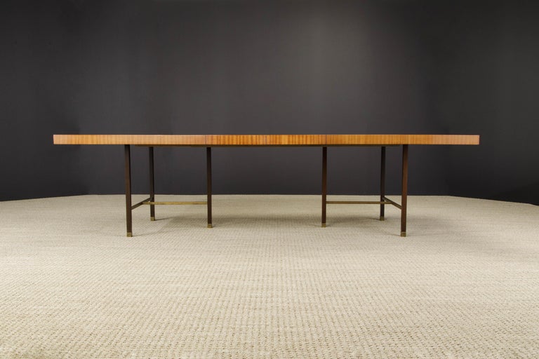 This grand 1950s Mid-Century Modern classic design by Harvey Probber is an extendable dining table in Mahogany and brass and was newly restored in a French Polish lacquer. 

This minimalist design was a huge hit in the 1950s in upscale Mid-Century