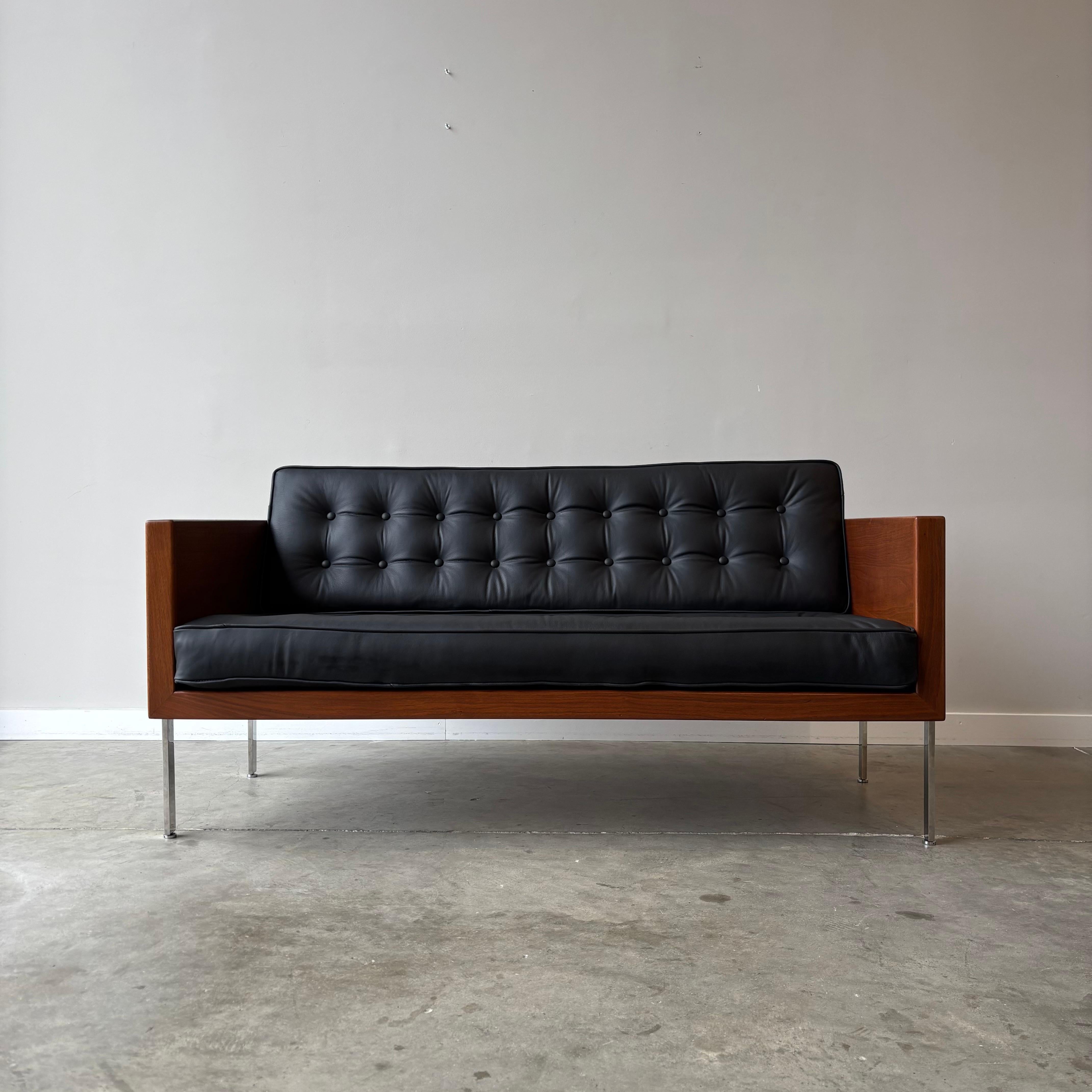 Harvey Probber Architectural Series Loveseat 

Harvey Probber loveseat from the Architectural series, featuring a restored walnut case with inset chrome legs. The clean-lined walnut frame creates a geometric enclosure around the seating area,