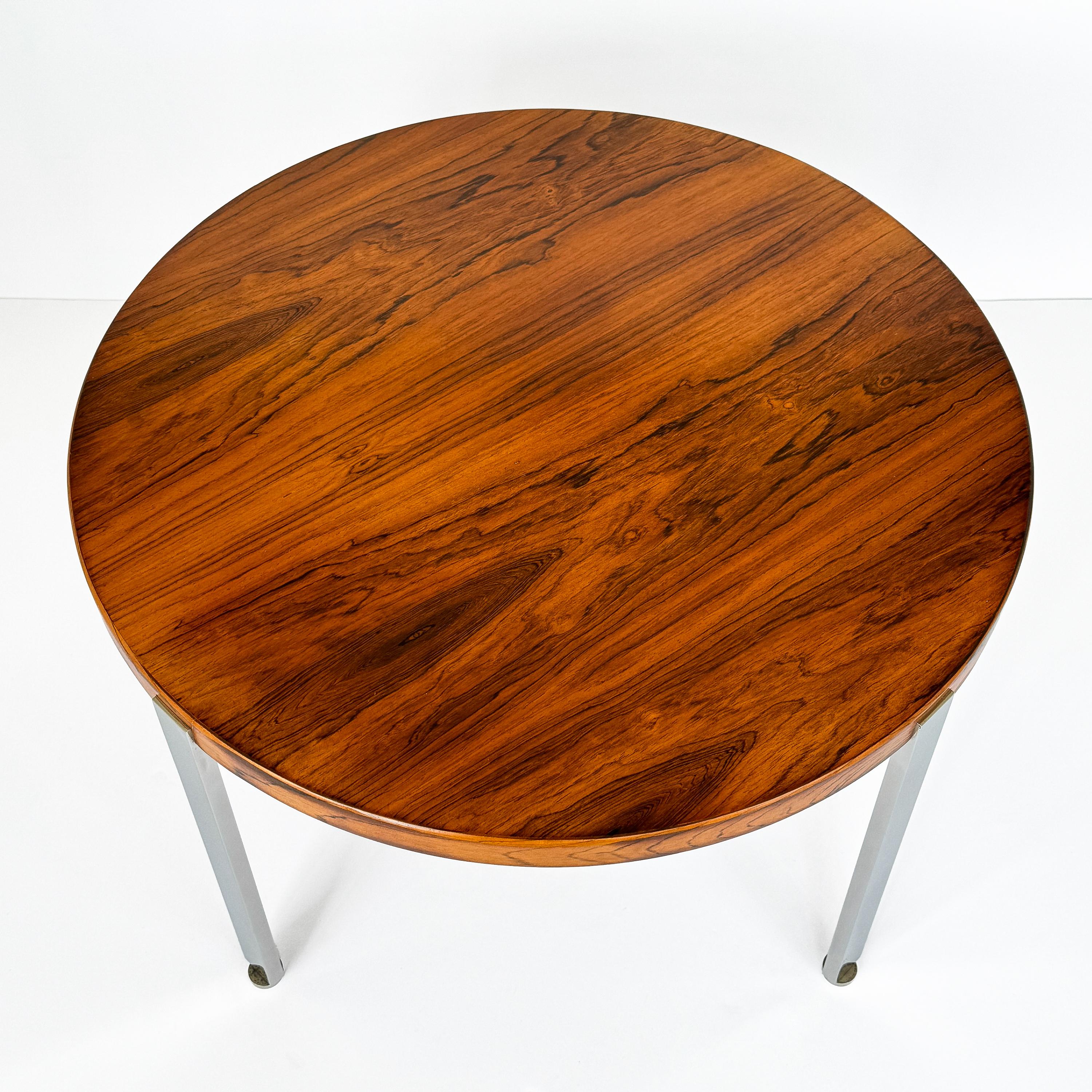 Discover the exquisite interplay of rich wood and polished metal in this Harvey Probber side table from the Architectural Series, a rare find from the United States circa 1960s. This piece is a testament to the enduring elegance of mid-century