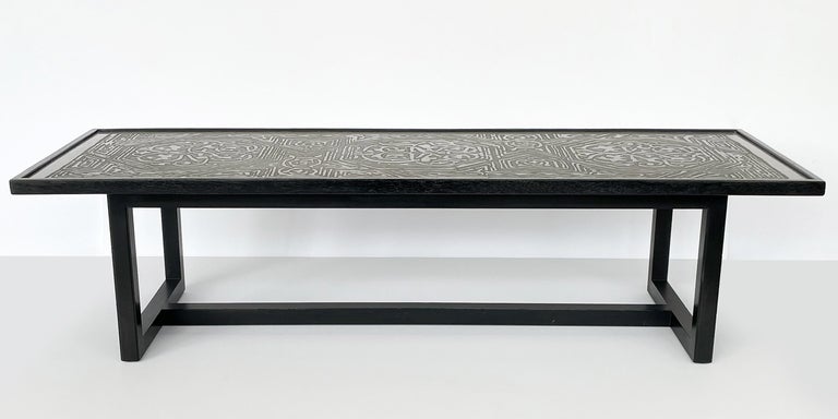 A rare coffee table No. 1322 with etched metal top and black ebonized mahogany frame by Harvey Probber, circa 1950s. Clean lined mahogany frame with black ebonized finish. Possibly refinished at an earlier point in this table's life. The intricate