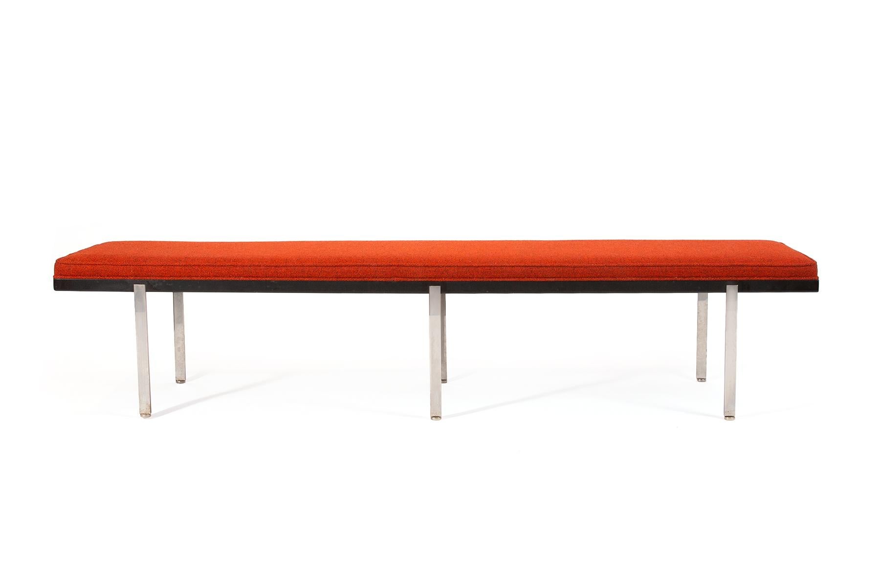 All original Harvey Probber bench circa early 1960s. This large scale example retains its original upholstery floating steel legs and ebonized metal trim.