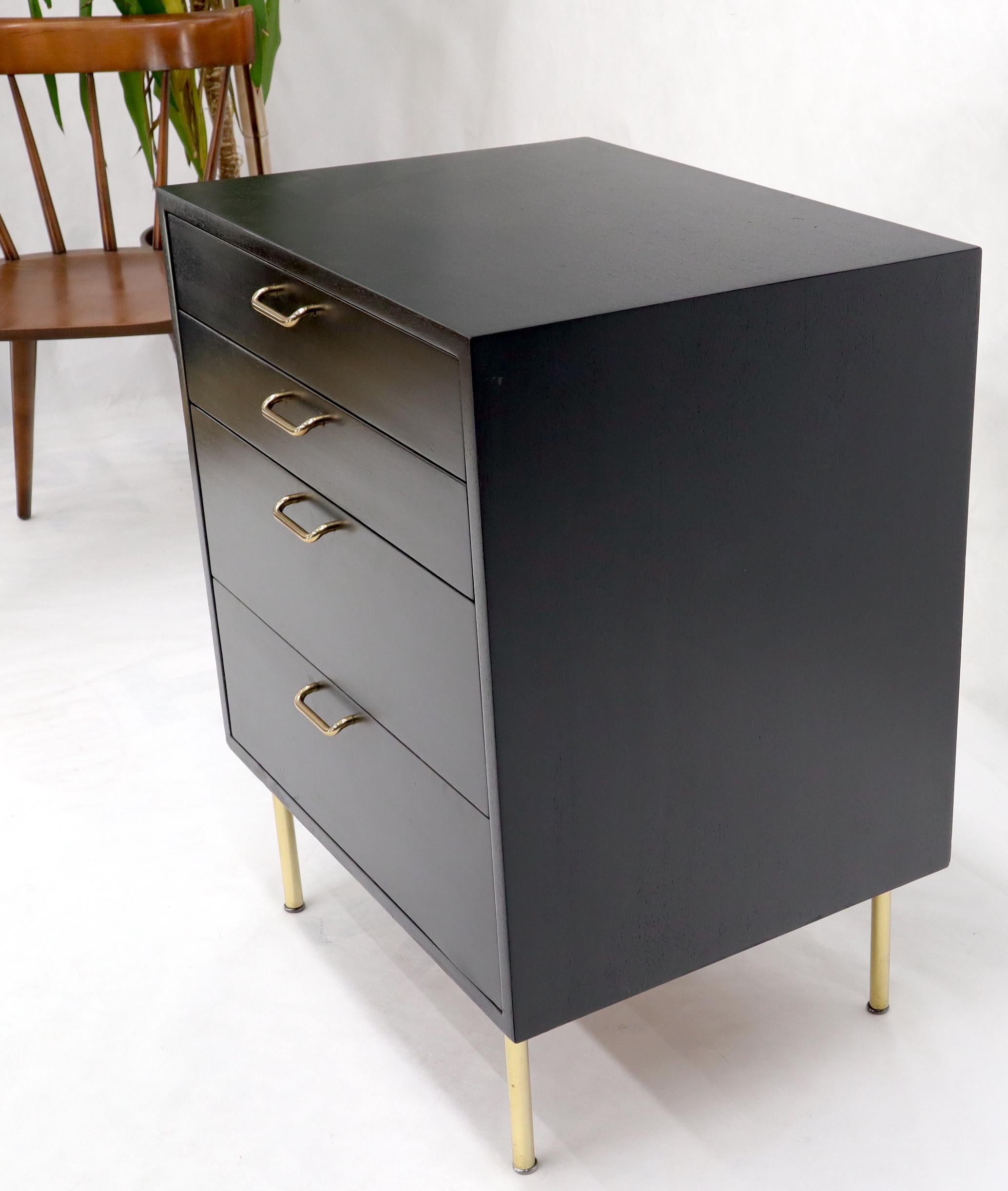 black chest of drawers with legs