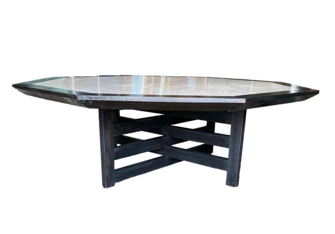 Harvey Probber Blackened Walnut & Inlaid Travertine Coffee Table
USA, !950s

A rare find, designed by Harvey Probber in the 1950s, constructed in two parts, the octagonal top with inlaid triangles of travertine, raised on a trellis base. Of good