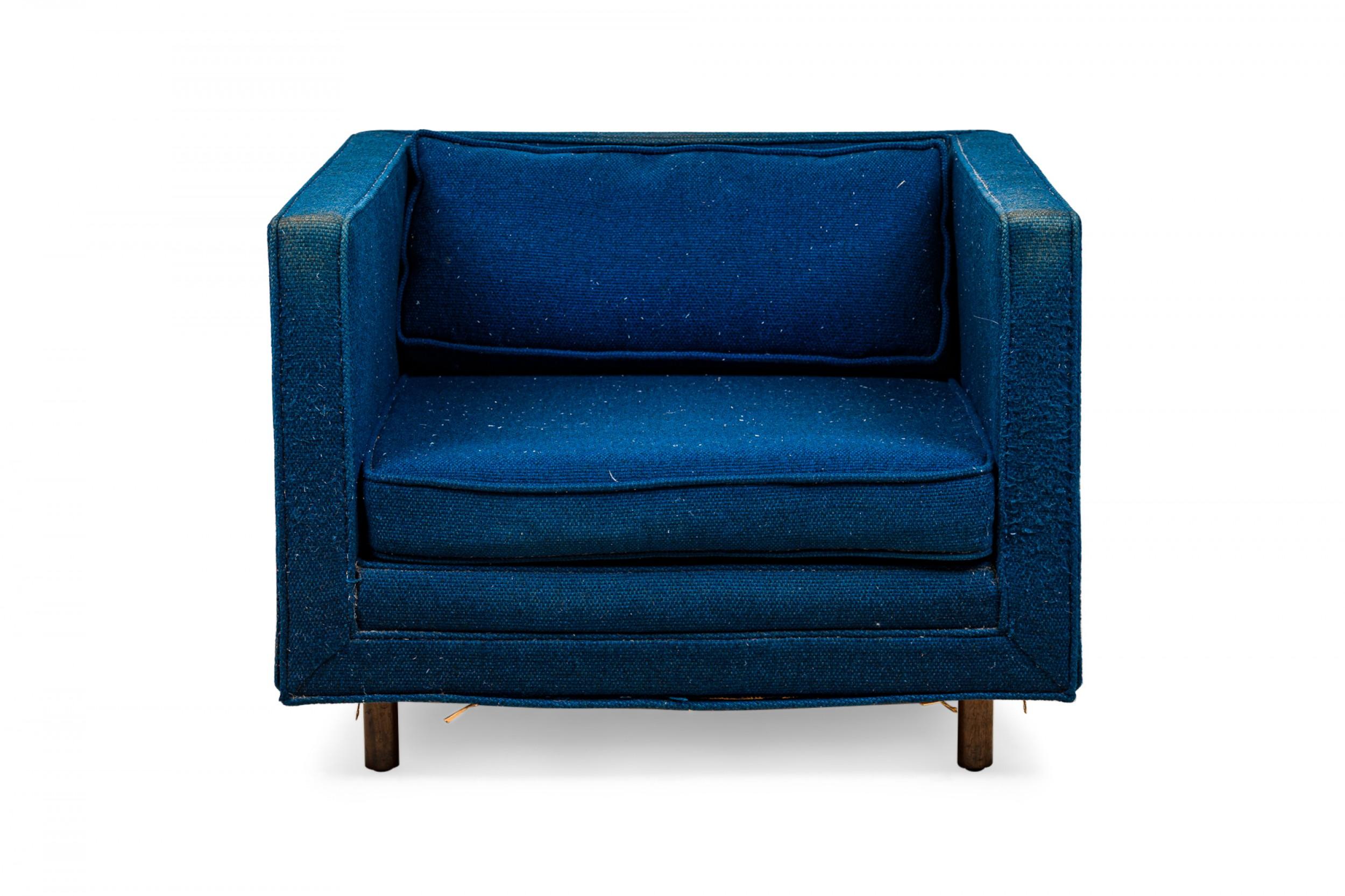 American Mid-Century cube form lounge / armchair with textured royal blue fabric upholstery and a matching removable back cushion. (HARVEY PROBBER)(Available in black: DUF0509B).
 