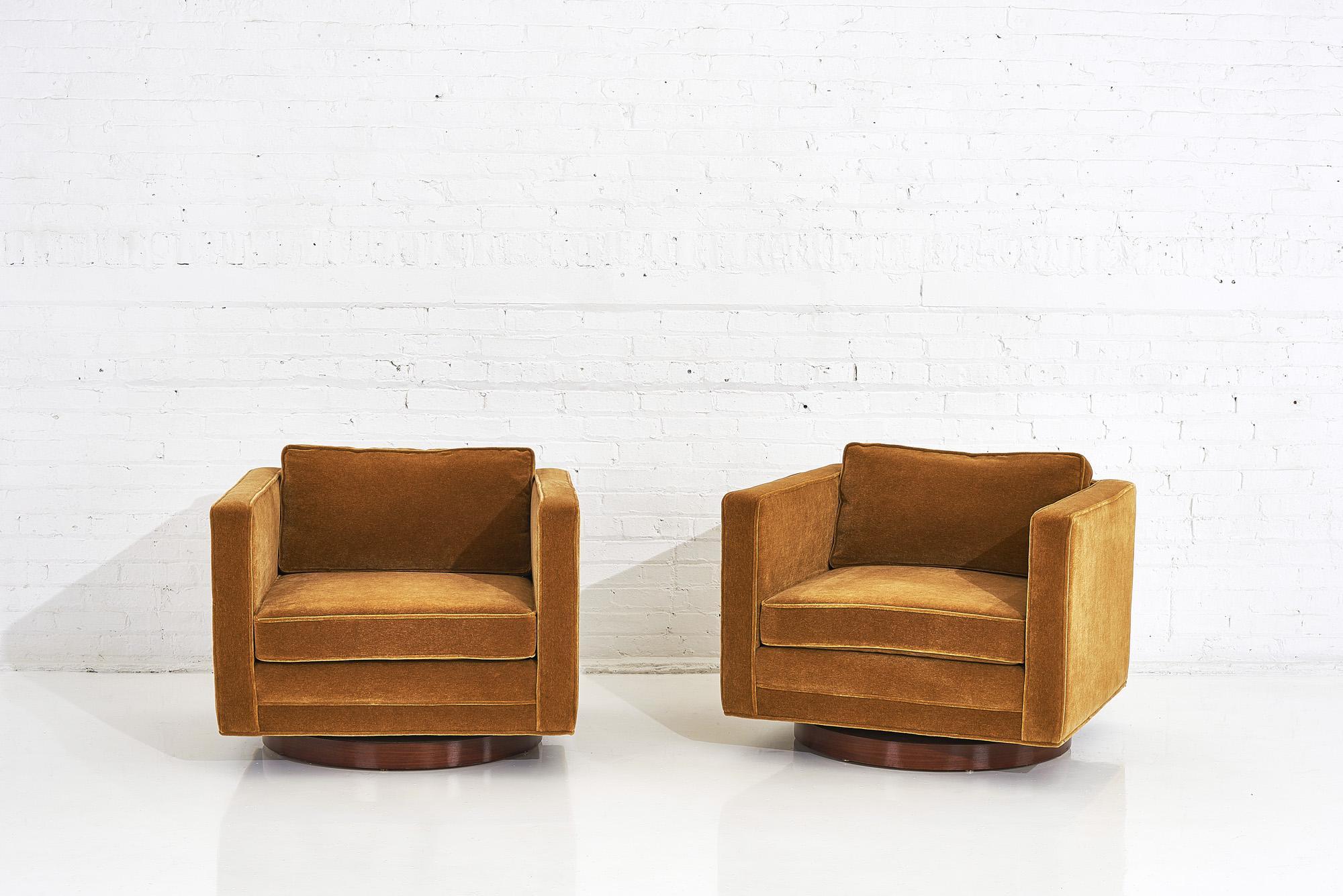 Pair of Harvey Probber cube swivel chairs on walnut bases. Model no. 1461, circa 1950s. Reupholstered in Mohair.