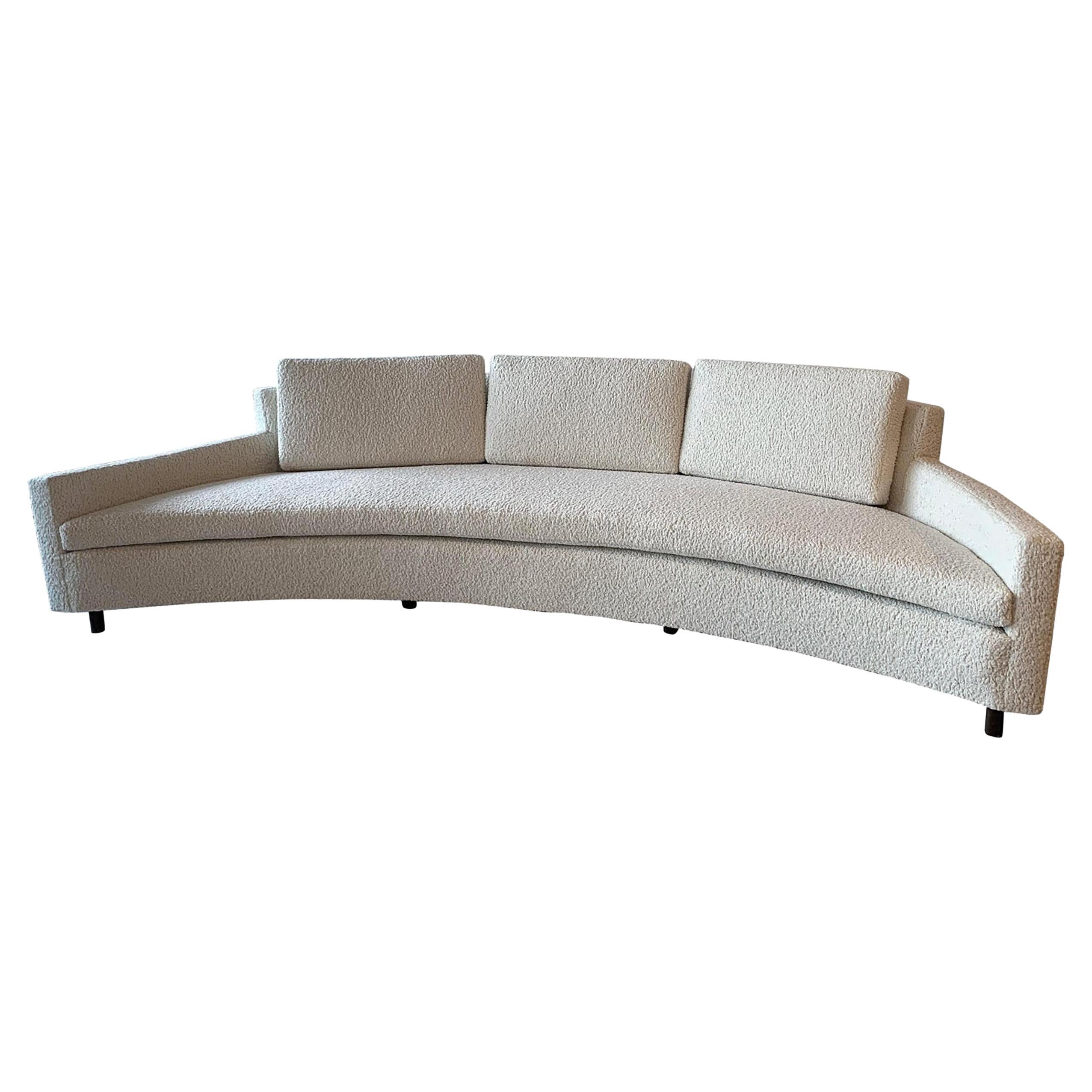 
Available right now, we have this stunning crescent sofa by design master, Harvey Probber! Picture this: You're lounging in sheer opulence on a sofa that's as curvy as the bird streets, and equally as glamorous. And guess what? We've got not one,