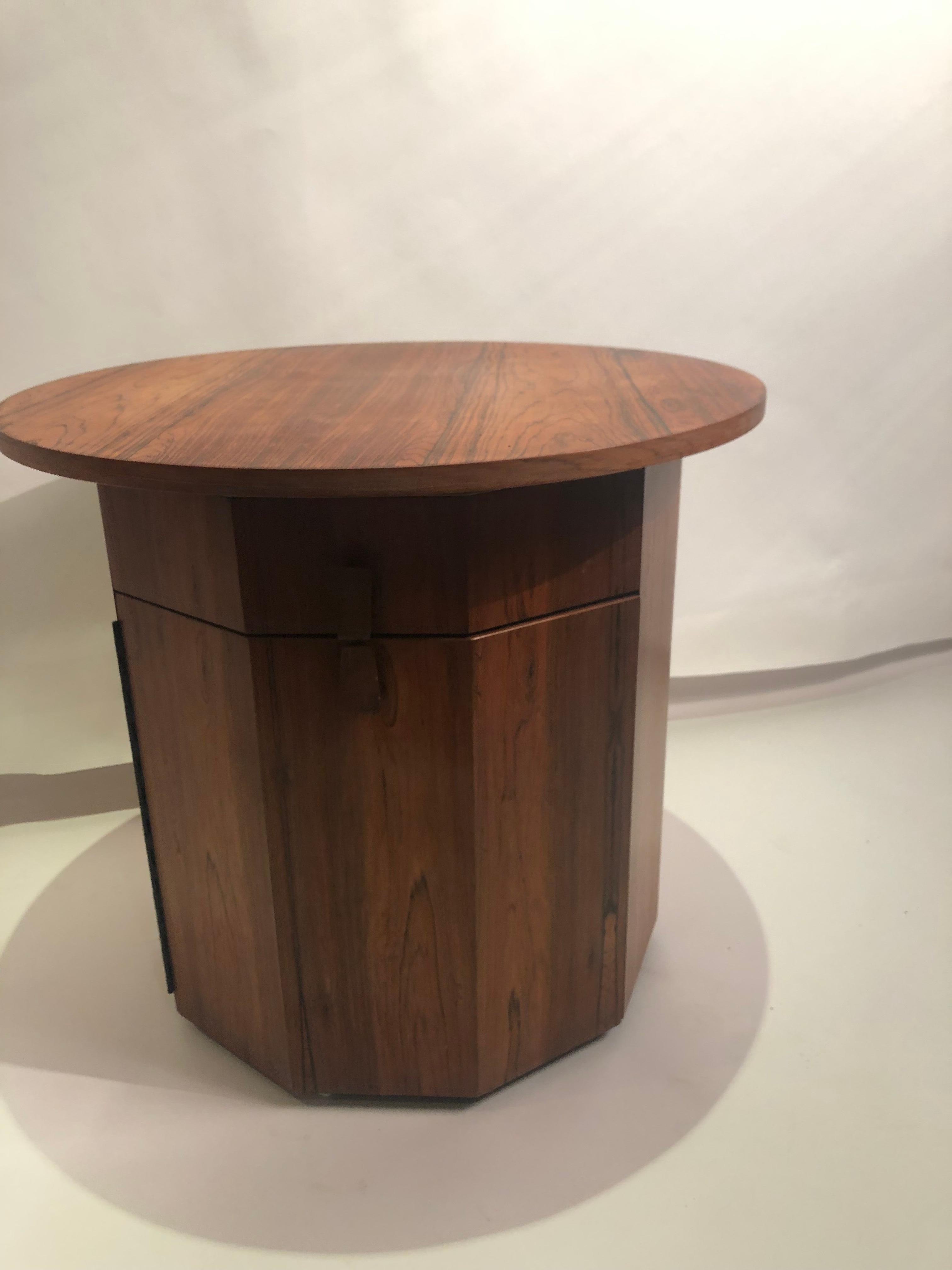 Beautiful and functional for home or office this Harvey Probber dry bar cabinet table makes a great addition to any room. Made of rosewood with solid construction retains union stamp and makers tag. Below the side table surface is a drawer and a