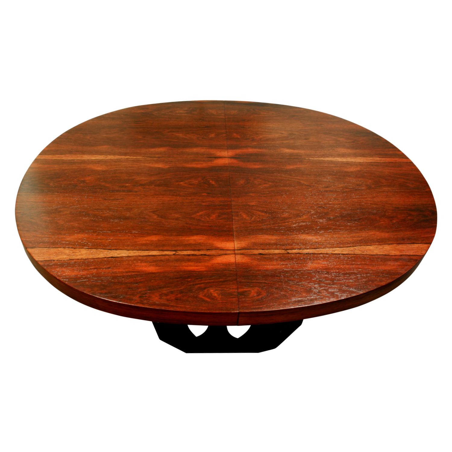 Dining table model No 1287 with top in Brazilian rosewood and sculptural base in mahogany by Harvey Probber, American, 1950s. Dining table comes with three leaves. Harvey Probber's craftsmanship is unsurpassed and this table has been completely