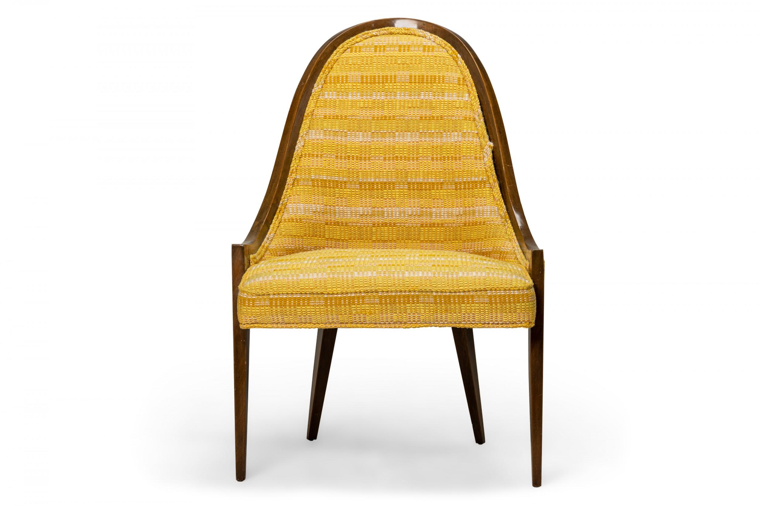 American Mid-Century 'Gondola' pull up / side chair with a curved light mahogany frame and gold woven fabric upholstered seat back and cushion, resting on four tapered mahogany dowel legs. (HARVEY PROBBER)(Similar pieces: DUF0423-DUF0426)
