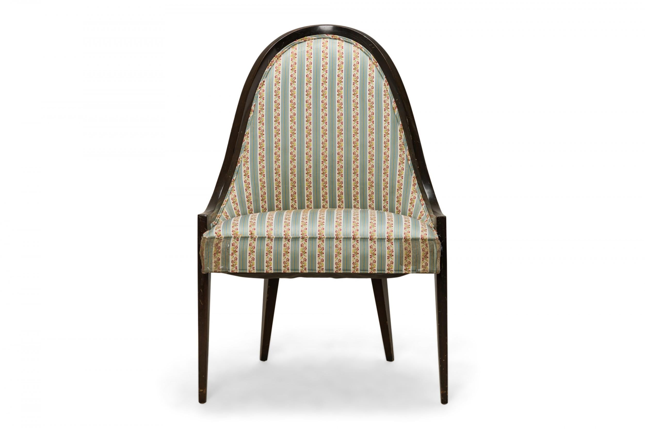 American Mid-Century 'Gondola' pull up / side chair with a curved mahogany frame and blue and beige and pink striped fabric upholstered seat backs and cushions, resting on four tapered mahogany dowel legs. (Harvey Probber).
  