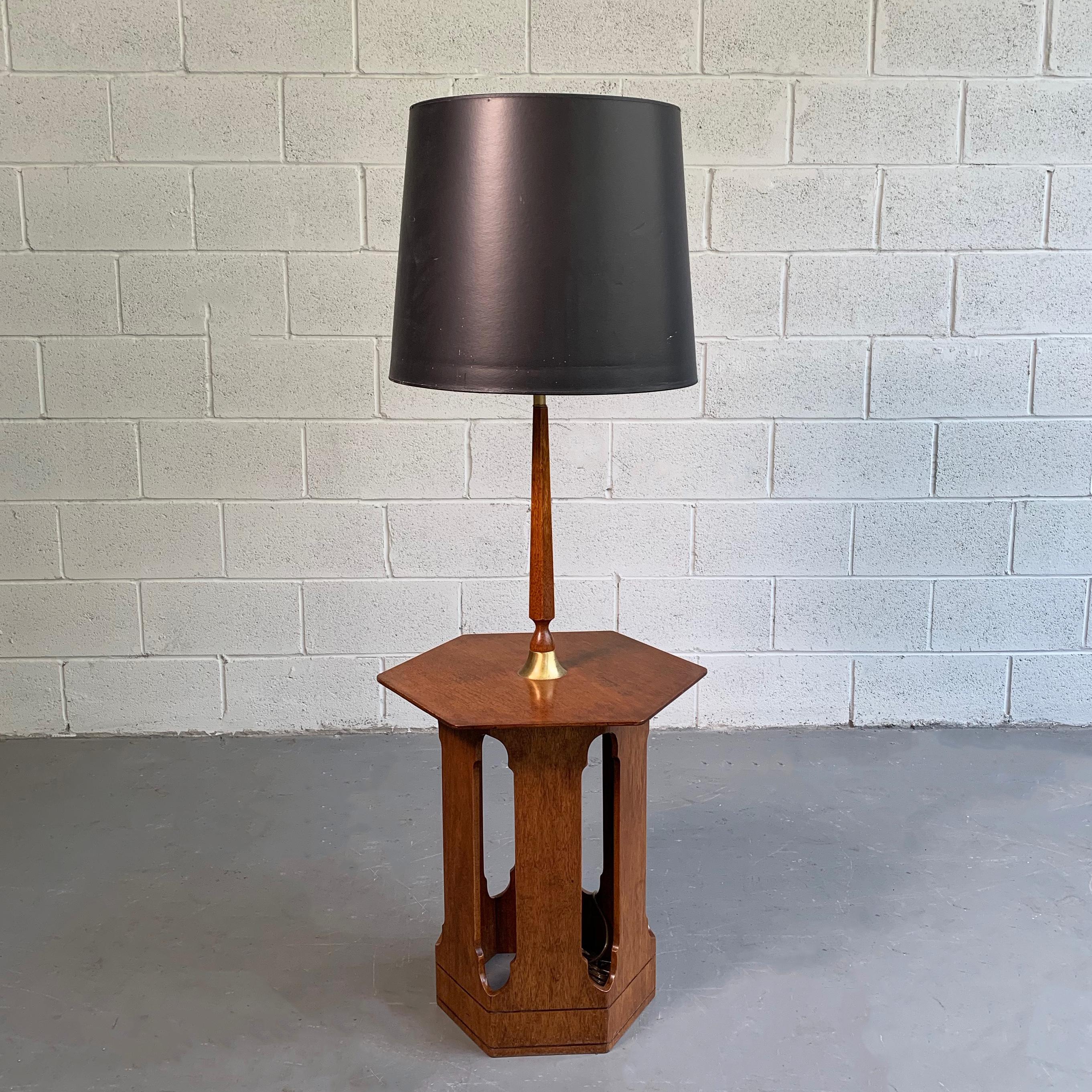 Mid-Century Modern, Moroccan inspired, floor lamp in the style of Harvey Probber features a cut-out, hexagonal table base at 22 inches height with brass accents. 