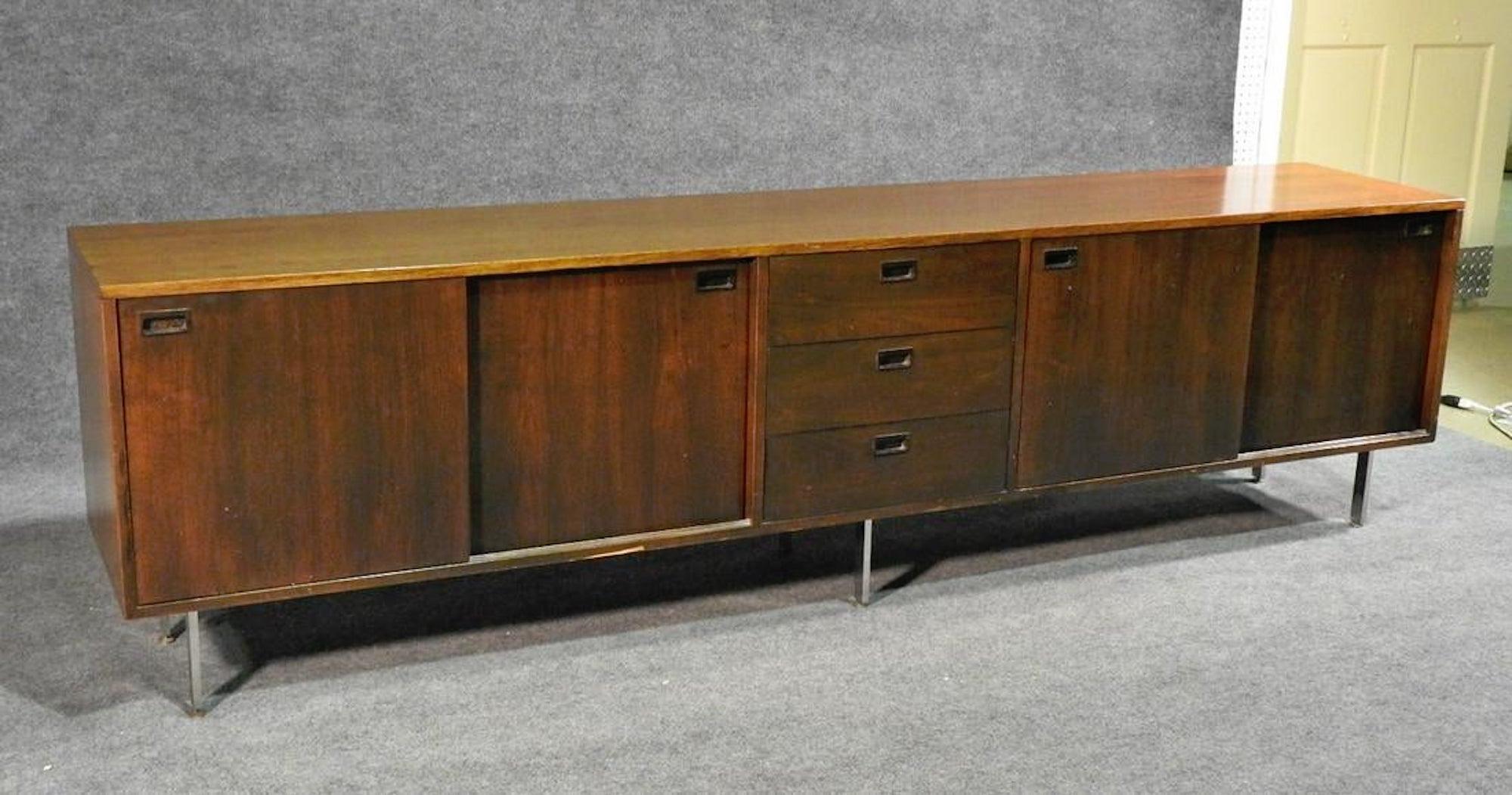 Mid-Century Modern long credenza designed by Harvey Probber.
(Please confirm item location - NY or NJ - with dealer).
 