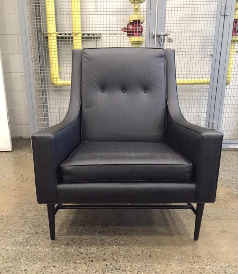 Harvey Probber lounge chair. Black vinyl upholstery with a lacquered stretcher base.
 