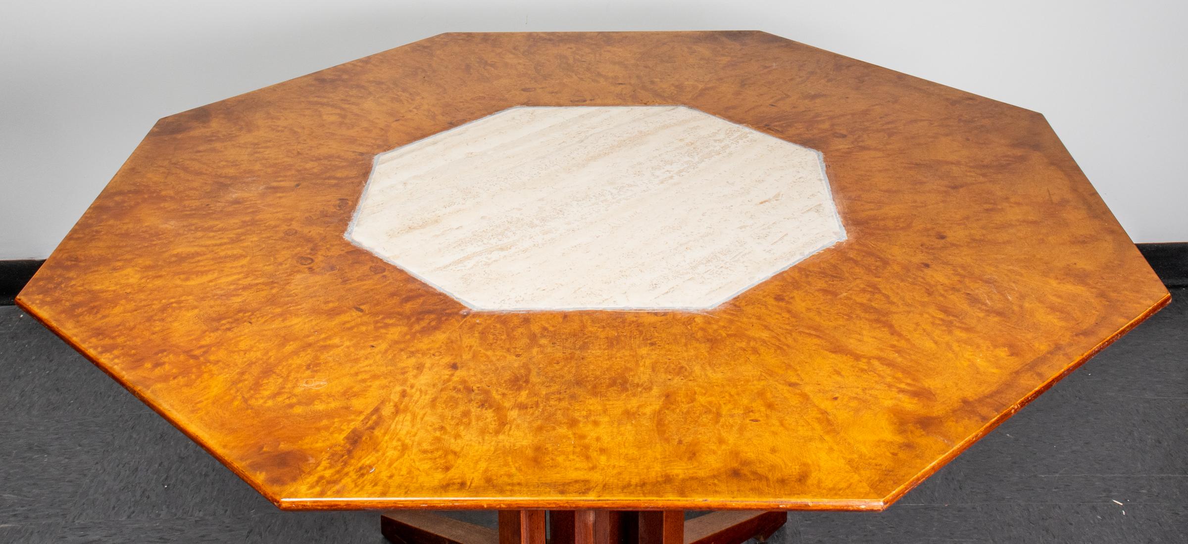 Mid-Century Modern octagonal burl wood dining table attributed to Harvey Probber, with inset travertine top. Measures: 28.75