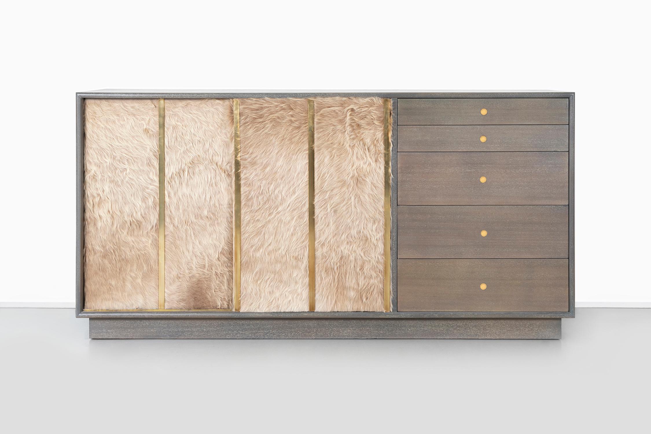 Credenza

Designed by Harvey Probber

USA, circa 1950s

Mahogany, brass and Brazilian cowhide

Measures: 32 ½” H x 65 ¼” W x 18” D

Manufacturer’s label on right side of top drawer.