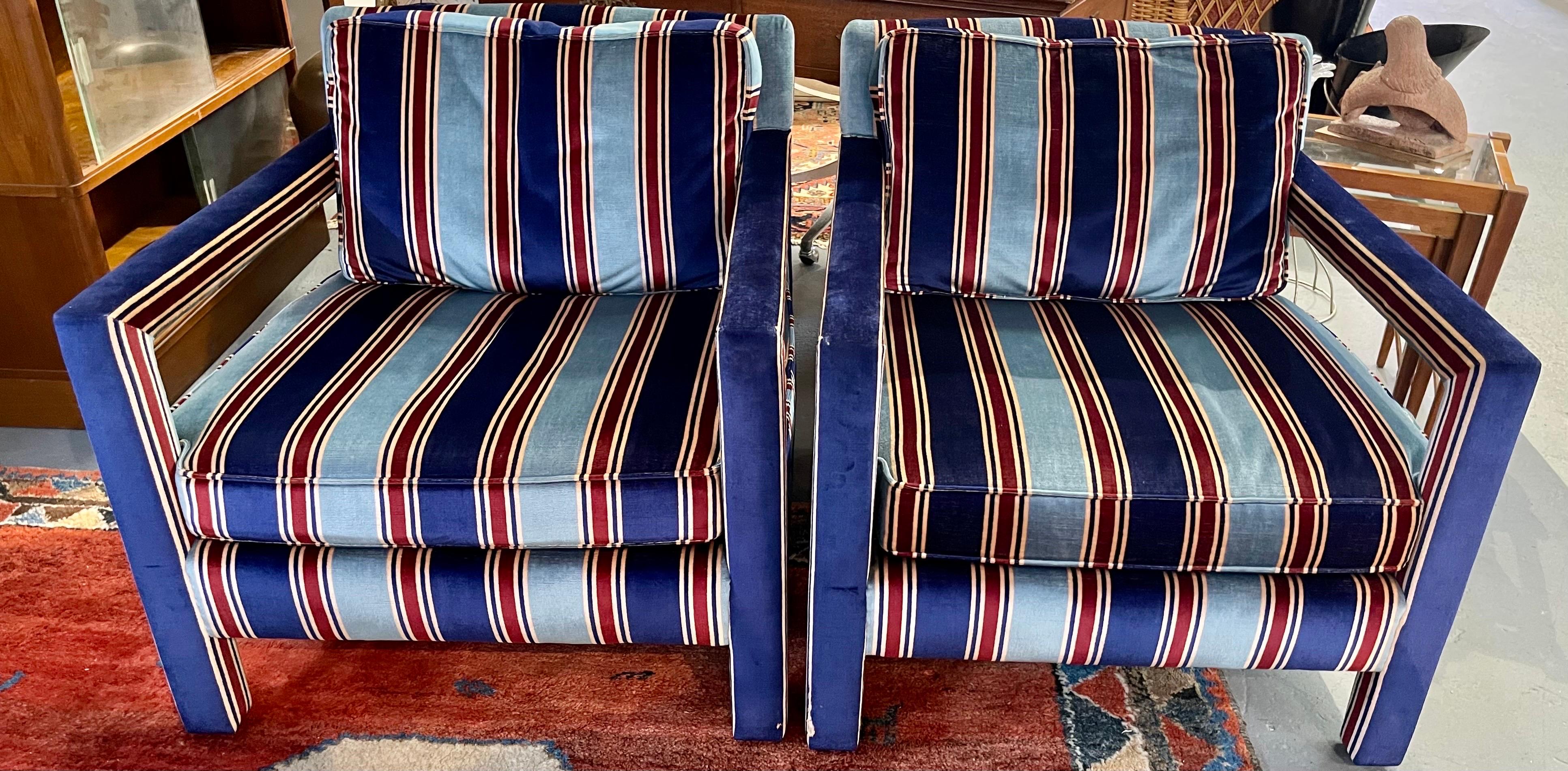 Iconic pair of fully upholstered striped arm chairs by Harvey Probber. Great scale, better lines and what a wonderful and vibrant color scheme on the mohair feeling fabric. Guaranteed to raise the design level in any room.