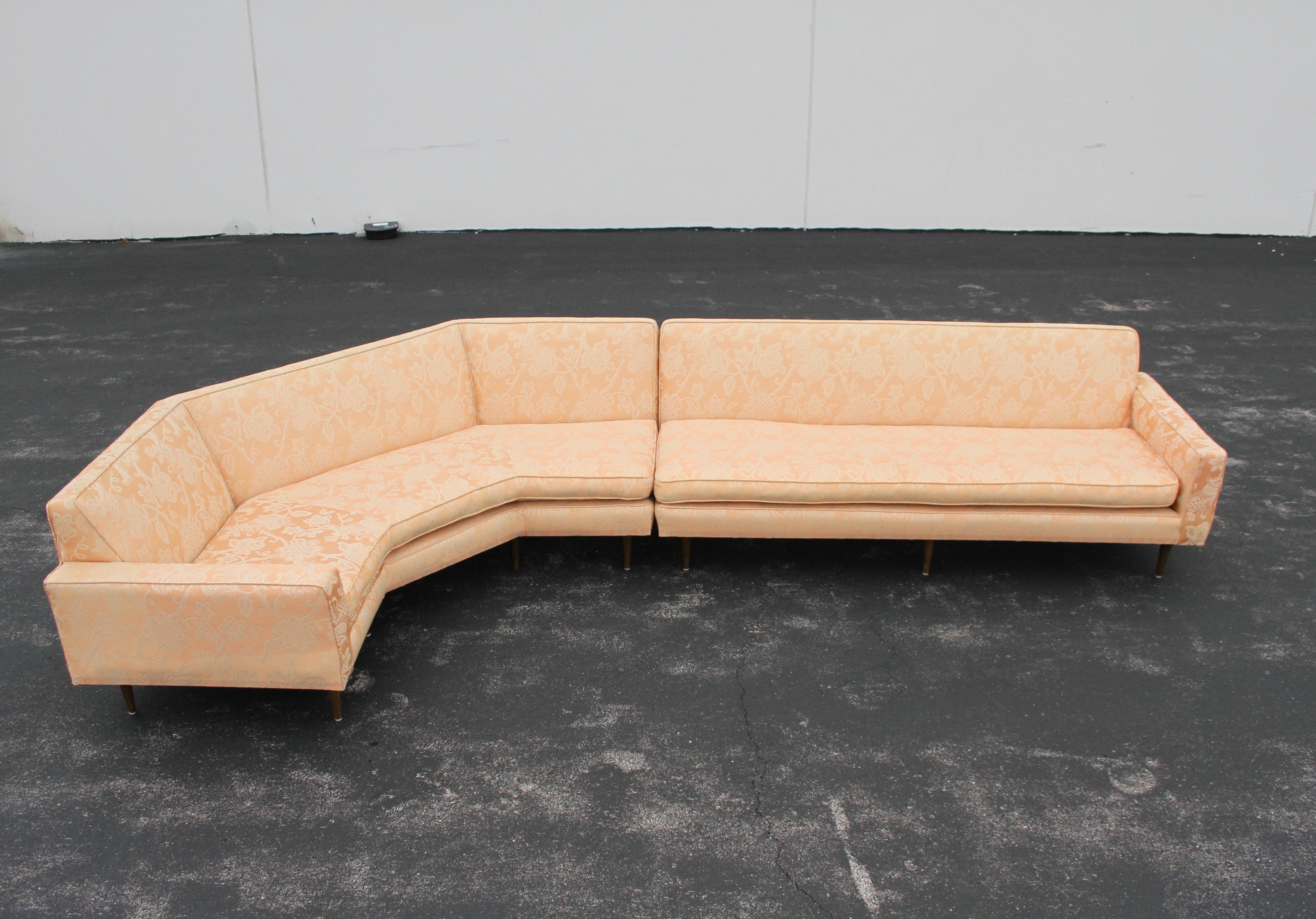 Mid-Century Modern 2-piece sectional sofa designed by Harvey Probber for his Nuclear Sert line. From one owner estate, older coral floral re-upholstery, is in need of re-upholstery, on original tapered magohany legs. Structurally sound, foam is