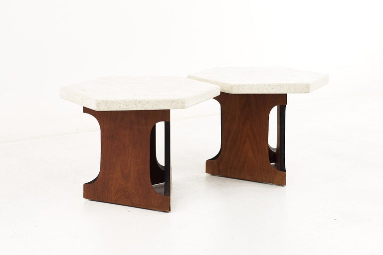 Harvey Probber mid-century terrazzo top hexagon side tables - a pair.

Each table measures: 21.75 wide x 21.75 deep x 15.25 inches high.

All pieces of furniture can be had in what we call restored vintage condition. That means the piece is