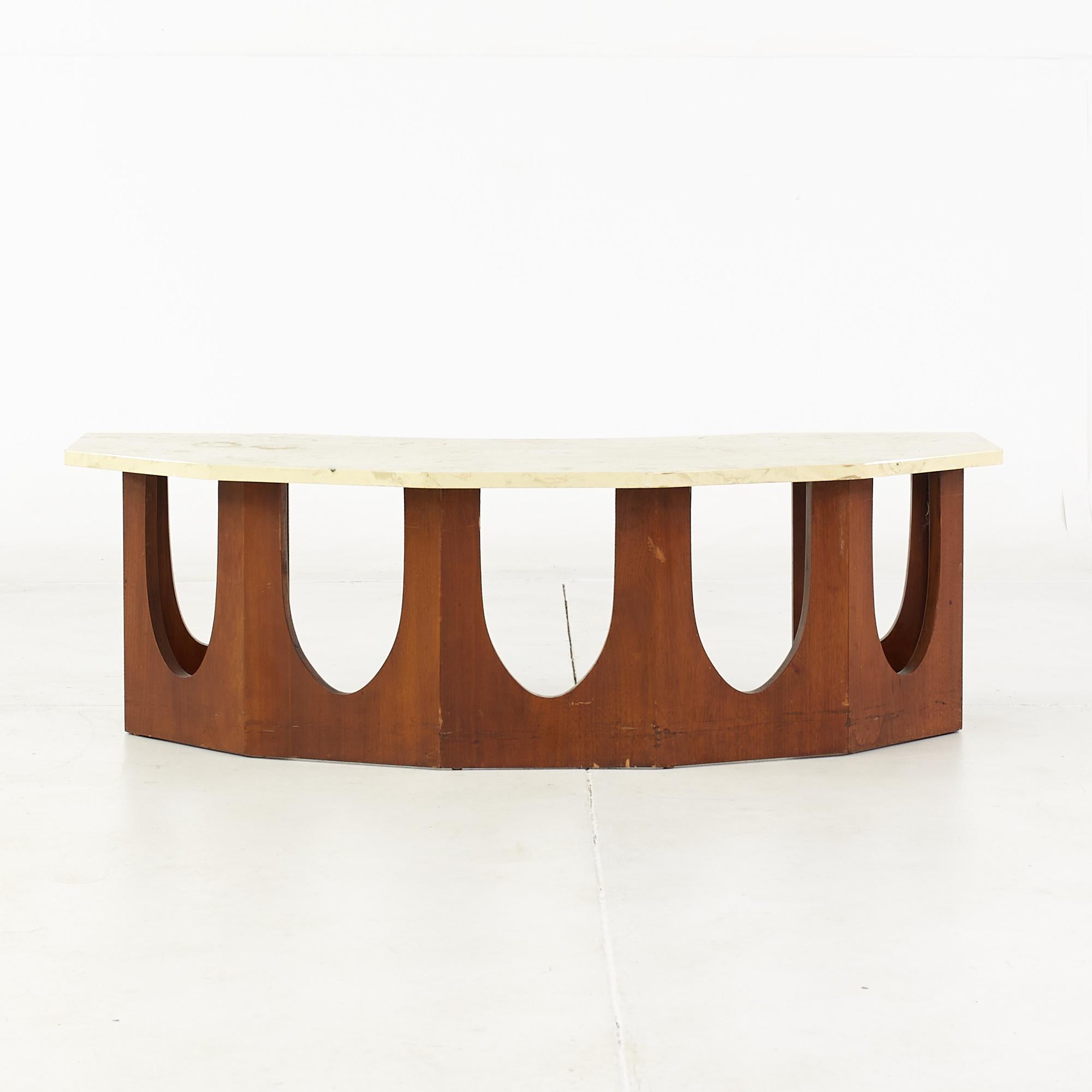 Harvey Probber mid century walnut and Travertine half crescent moon coffee table

This coffee table measures: 47.5 wide x 22 deep x 15 inches high

All pieces of furniture can be had in what we call restored vintage condition. That means the