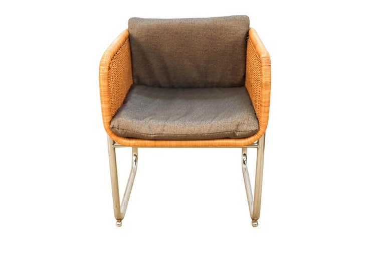 An amazing vintage model D43 wicker and chrome cantilever chair designed by Preben Fabricius & Jorgen Kastholm for Harvey Probber in Denmark. A rare chair of Probber chairs featuring a cube shaped frame with a woven wicker seat, back and sides