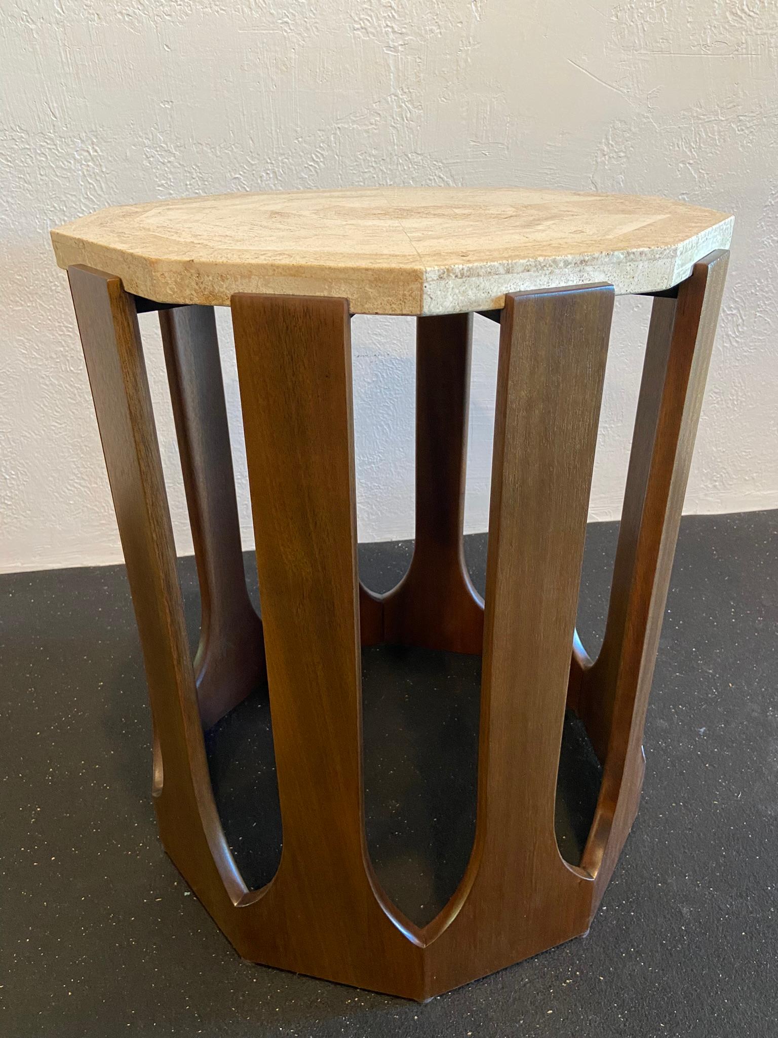 Harvey Probber mosaic travertine occasional table. Base constructed of mahogany. Table has been refinished and shows minimal signs of wear (please refer to photos).

Would work well in a variety of interiors such as modern, mid century modern,