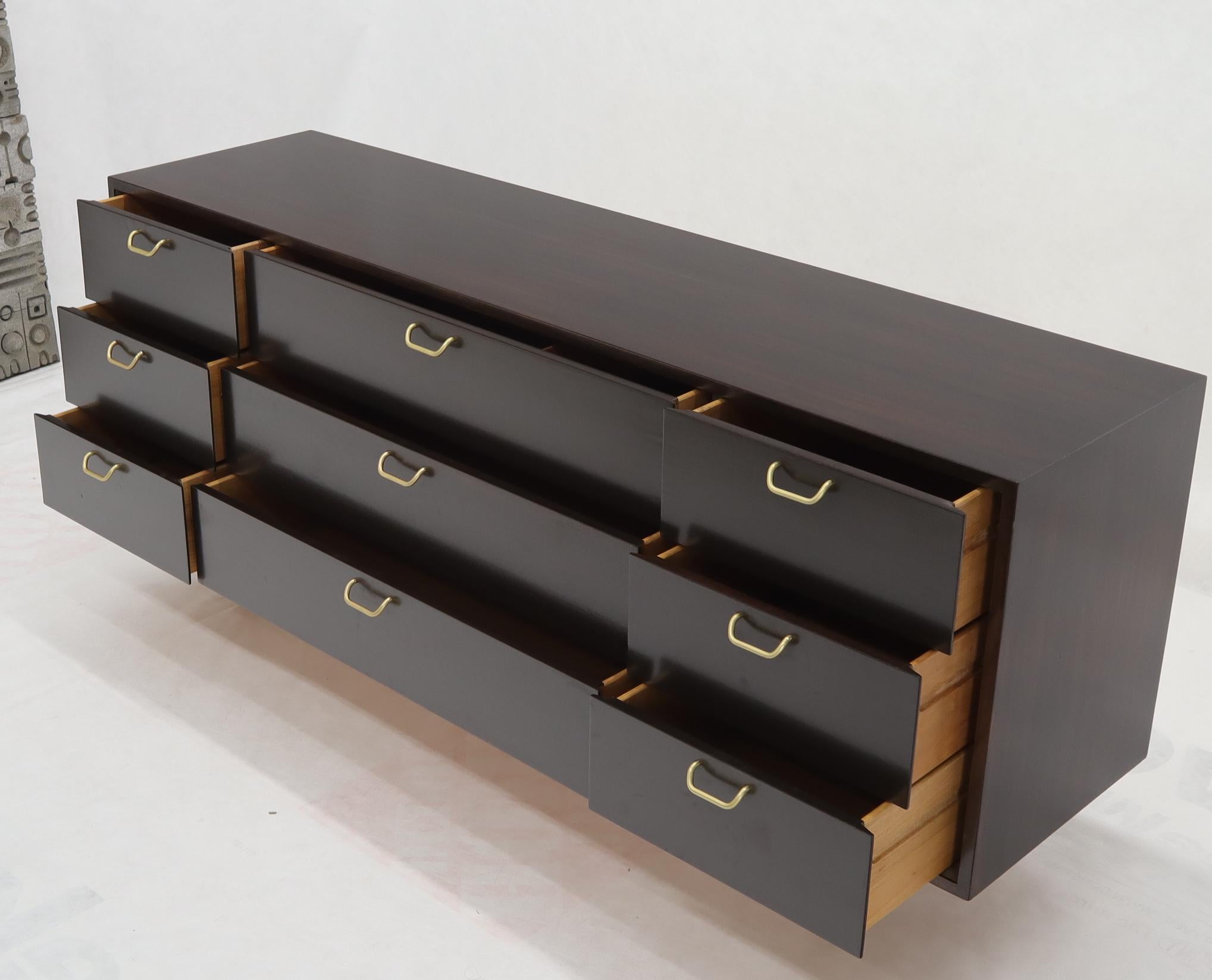 Mid-Century Modern nine drawers long dresser credenza by Harvey Probber. Espresso mahogany finish. Solid brass hardware.