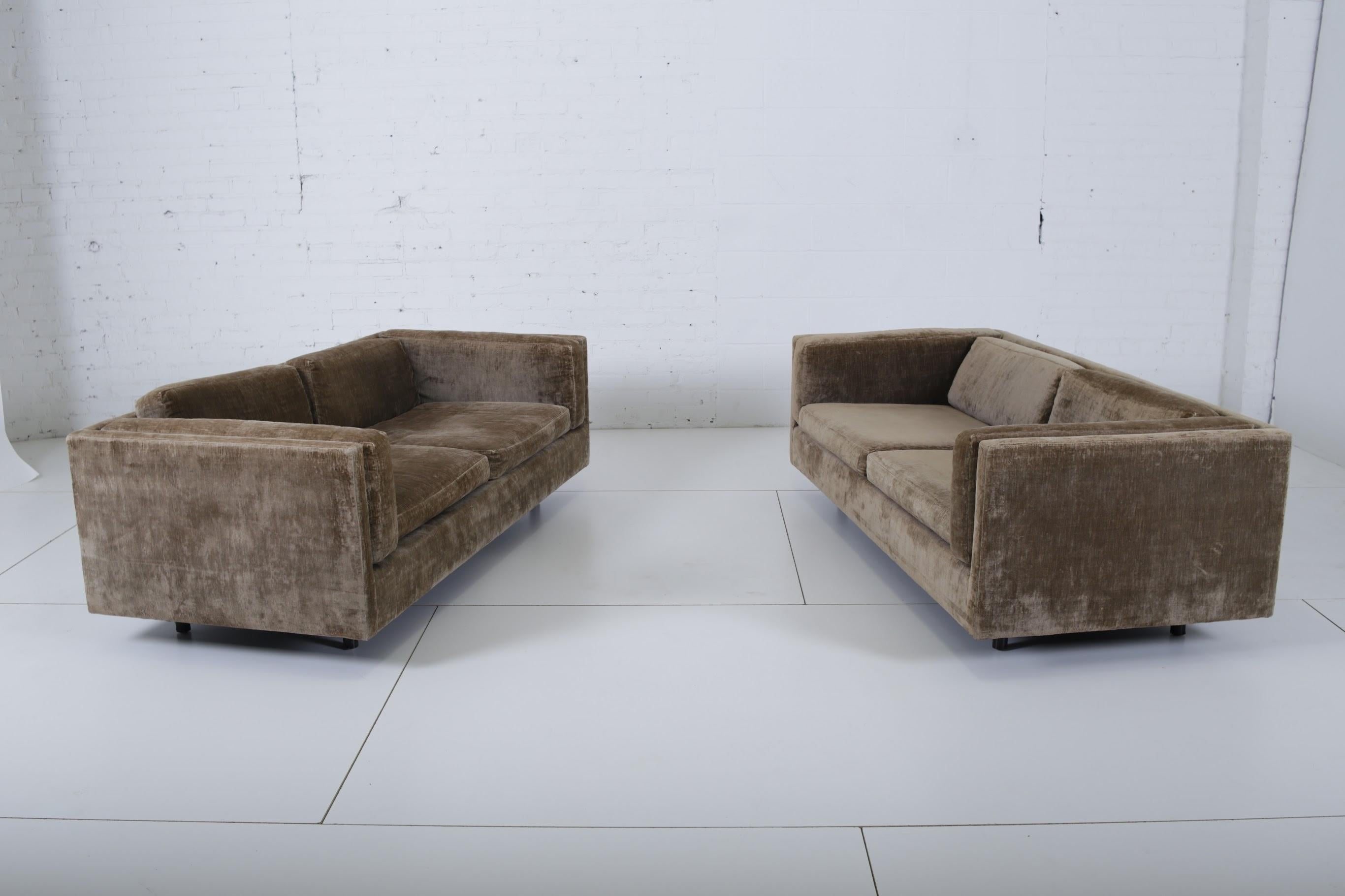 Tuxedo sofa settees by Harvey Probber. Original velvet fabric on rosewood legs. Pair available. Priced individually.