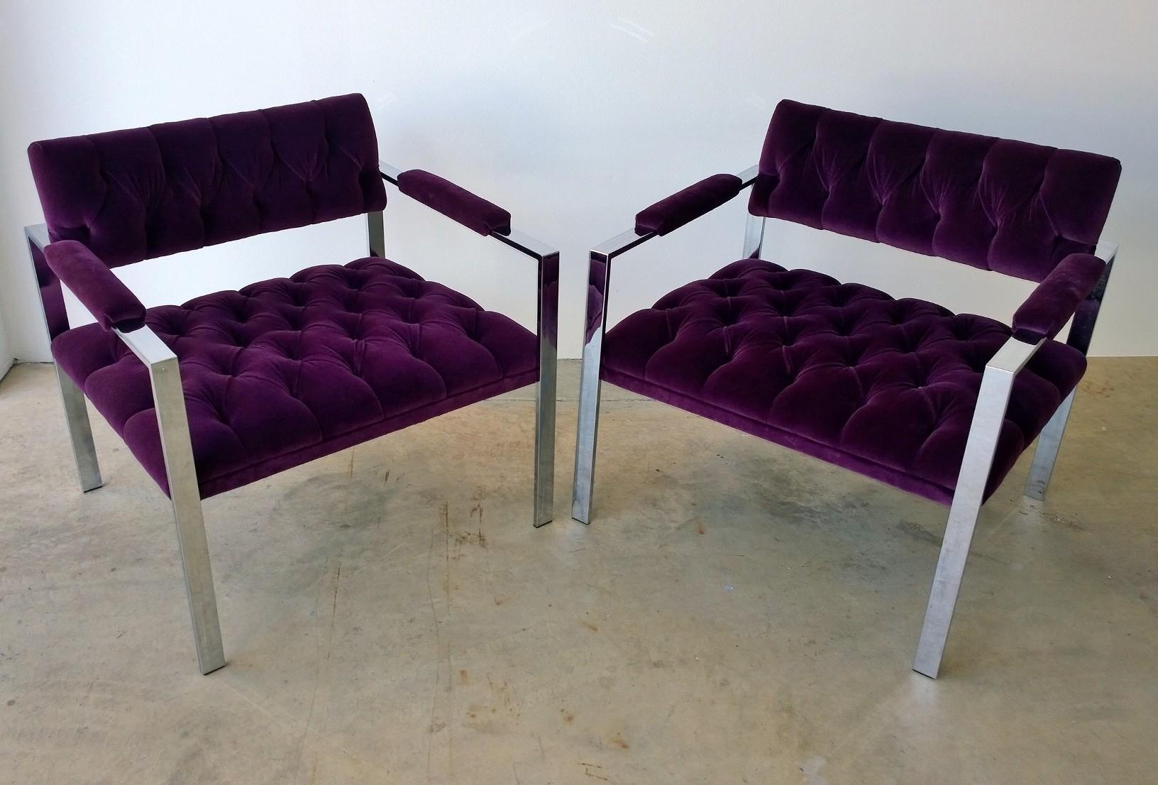 Offered is a pair of Mid-Century Modern Erwin-Lambeth arm or lounge chairs, beautifully button tufted in a brand new eggplant purple cotton velvet upholstery and finished off with a high sheen plated fame. This pair of Erwin-Lambeth arm or lounge