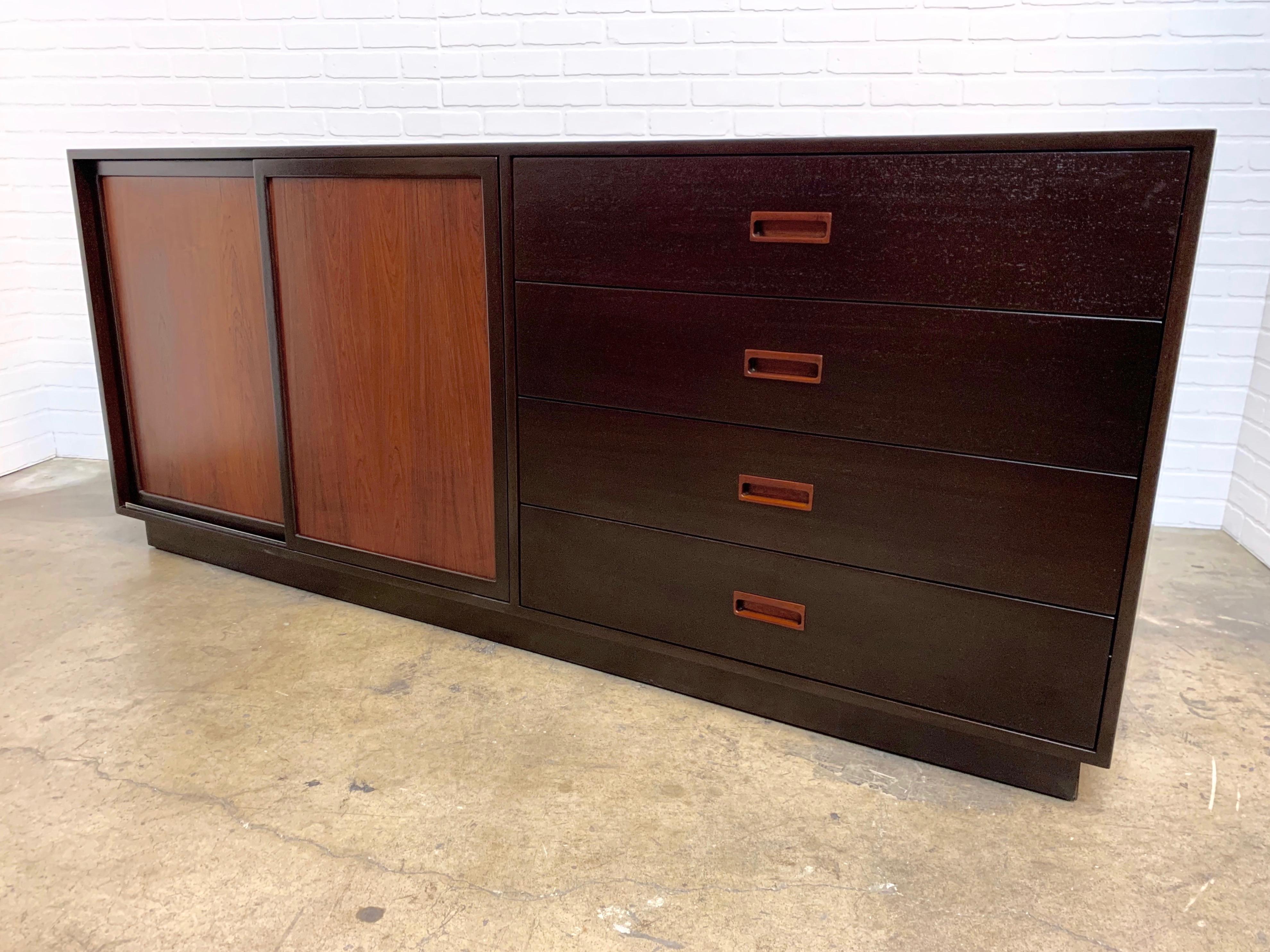 Harvey Probber rosewood and ebonized mahogany twelve-drawer dresser recently restored.
