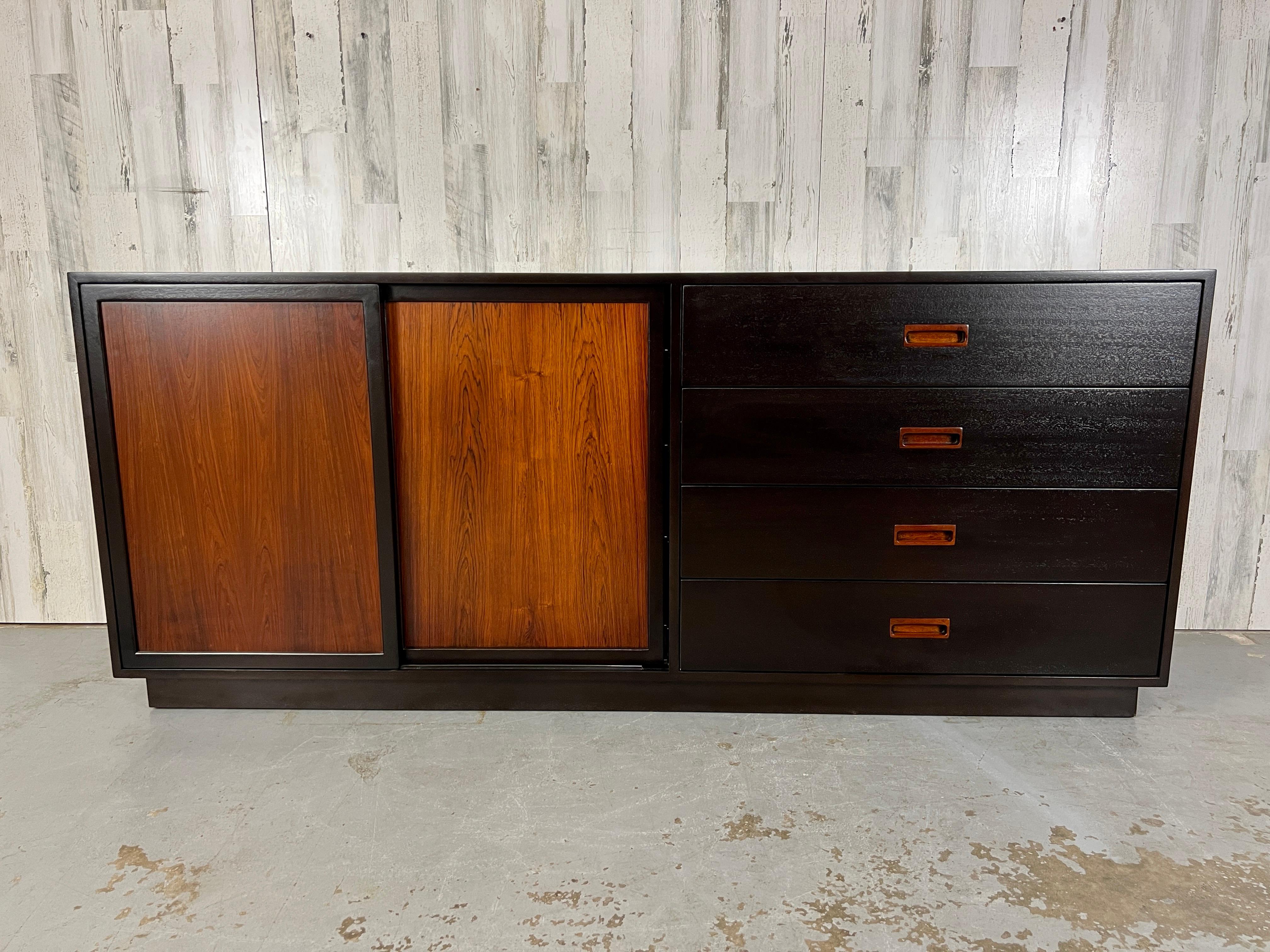 Harvey Probber rosewood and ebonized mahogany twelve-drawer dresser recently restored.