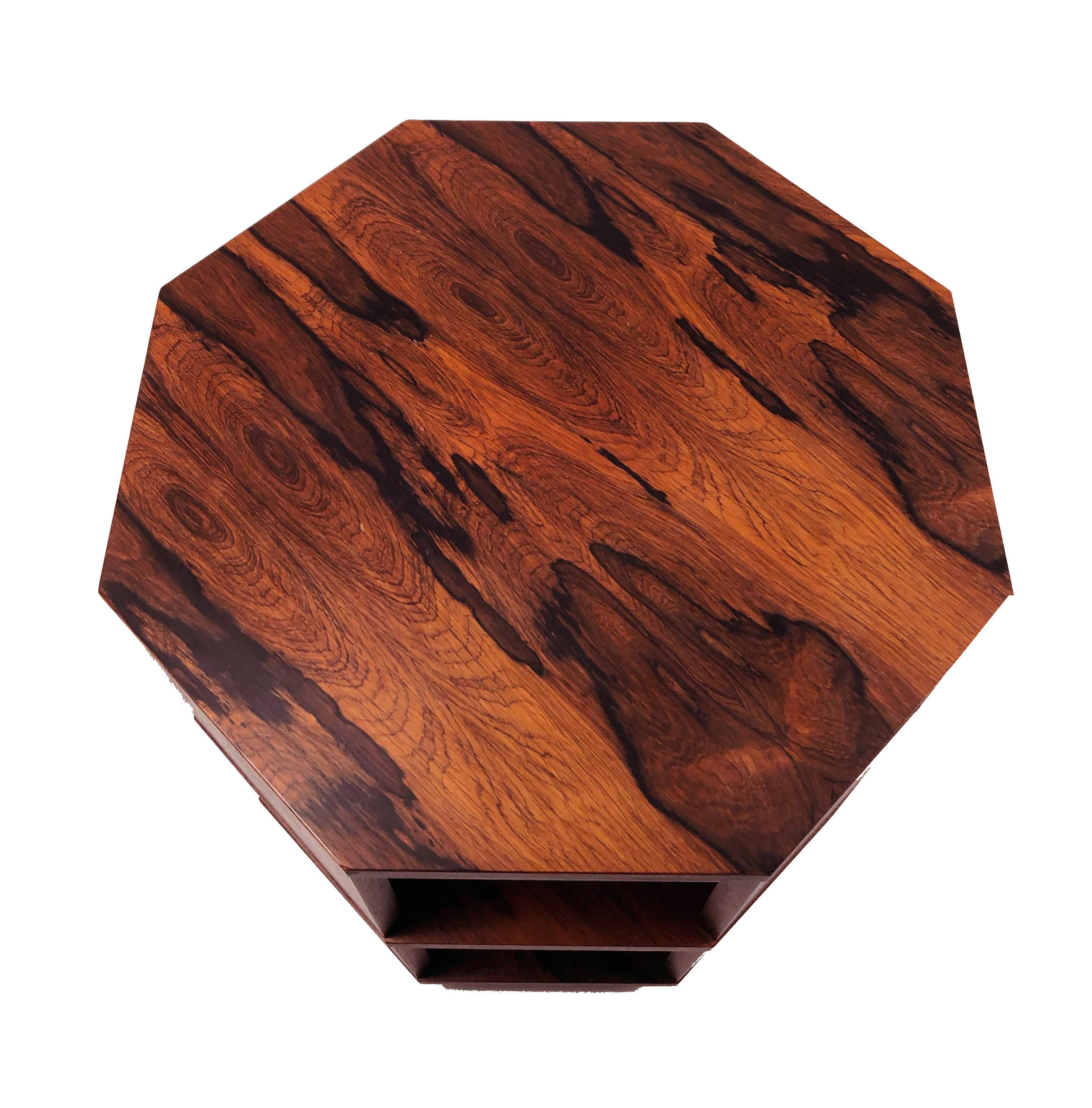 A beautiful rosewood octagonal side table with two inner shelf surfaces by Harvey Probber.