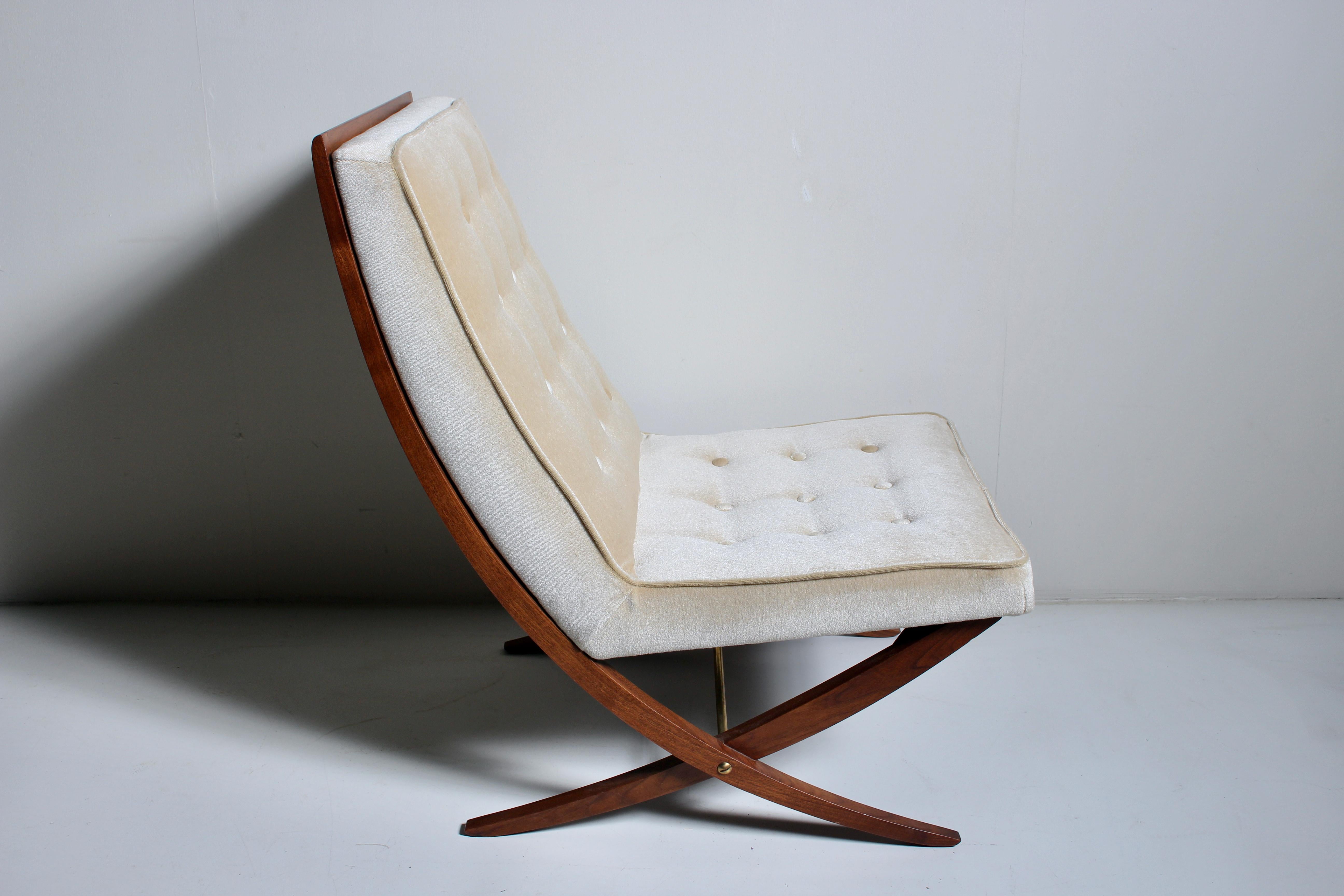 American Mid Century Harvey Probber attributed Scissor Lounge Chair.  Slipper Chair. Featuring a scissor-lined supported Walnut framework, saber legs, newly reupholstered in tufted, Creamy Velvet, with ergonomic, soft slanted back, comfortable seat,