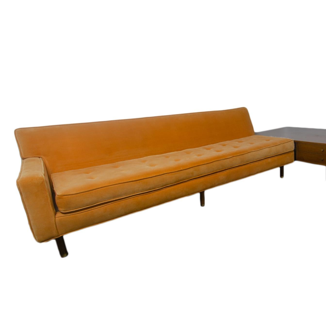 Sectional corner sofa with integrated end table, 1960s.  
Original orange velvet upholstery.  

sofa with full back: 84 inches wide by 33 inches deep by 30 inches tall
sofa with half back: 79 inches wide by 33 inches deep by 30 inches tall
table: 56