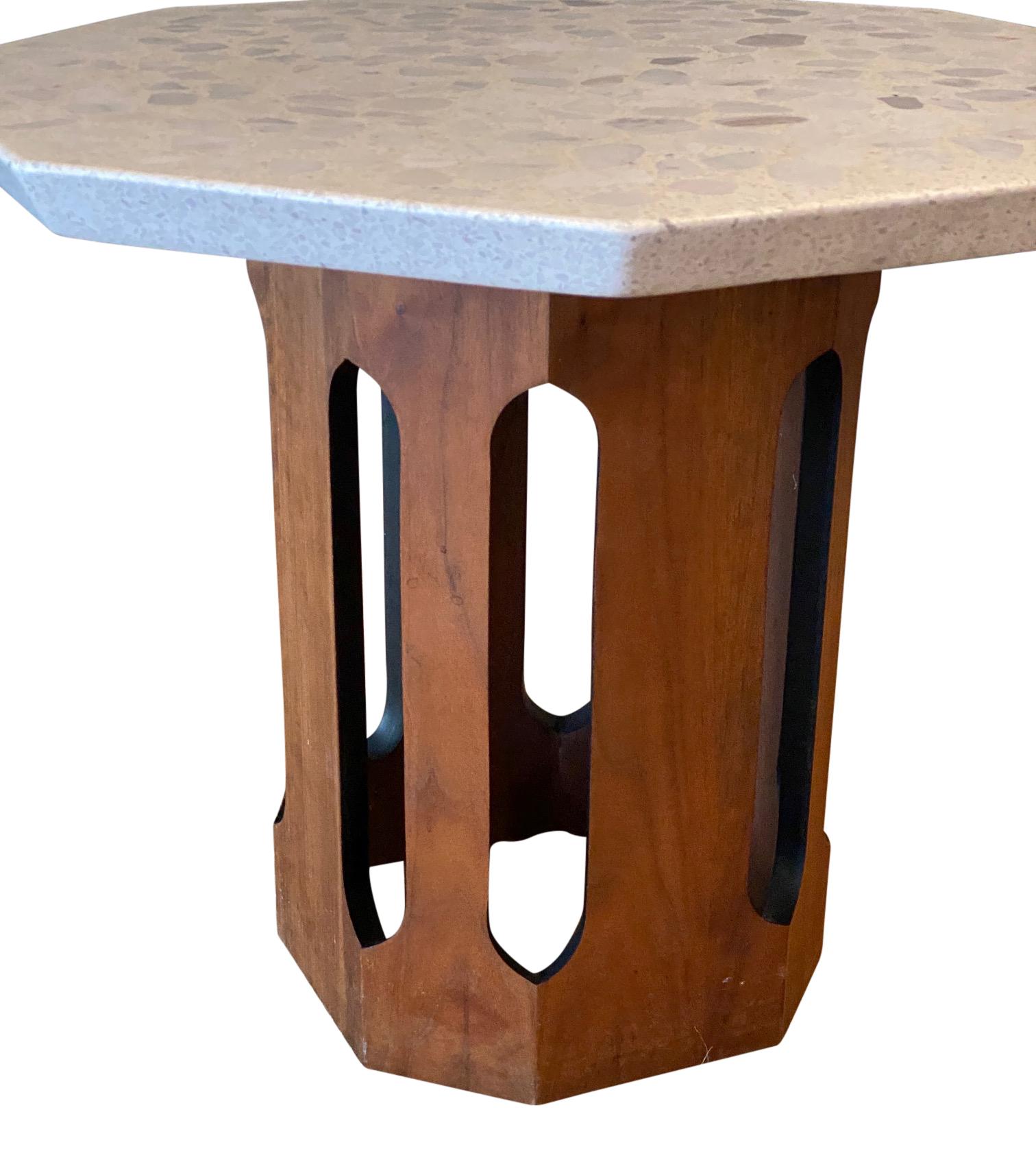 Harvey Probber octagon side table, travertine and sculpted walnut.