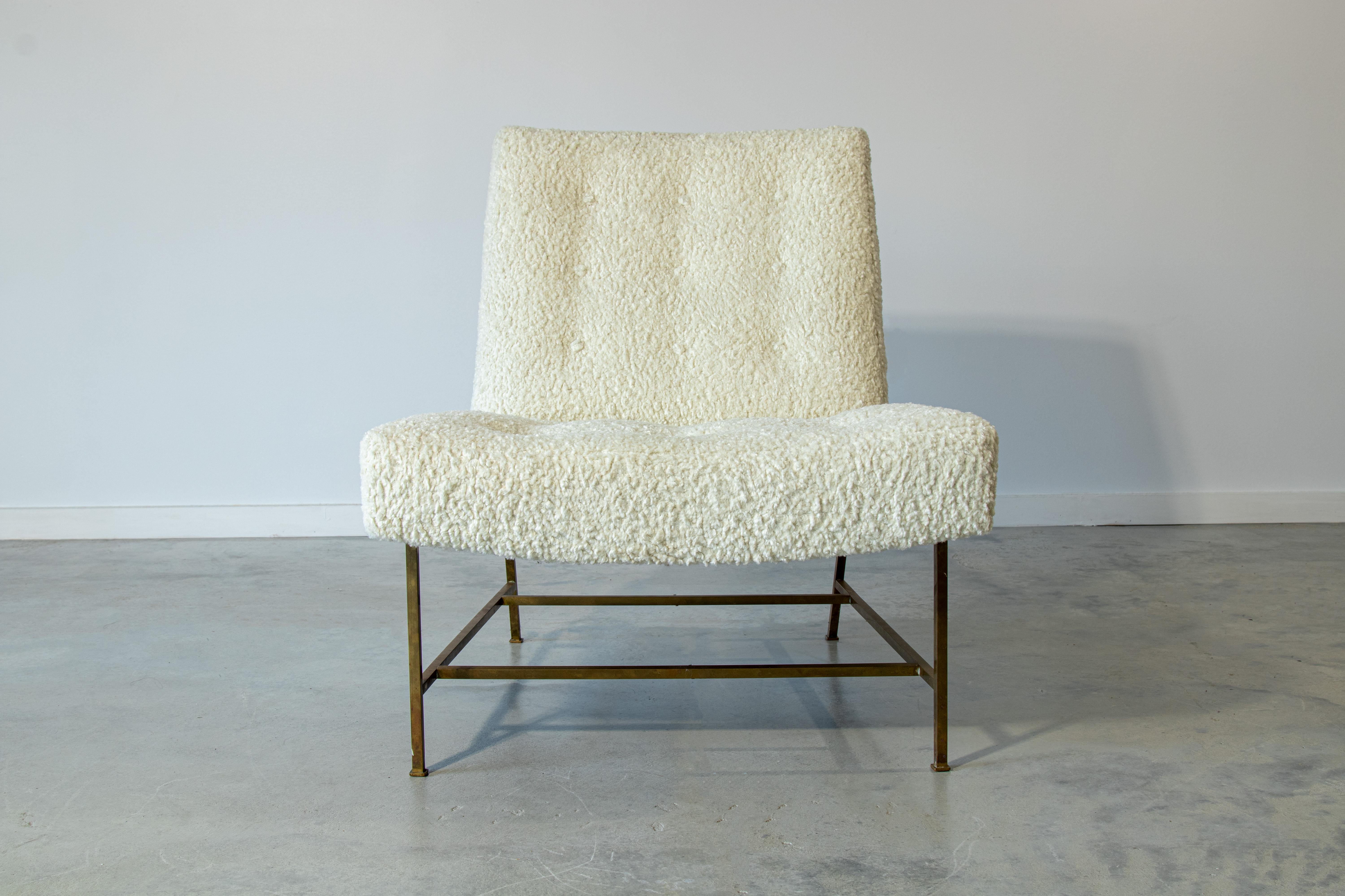 A rare offering from Harvey Probber. Very few examples have surfaced of this chair. Fully restored in white boucle with great curves floating on thin solid brass legs.

Condition:

New fabric and upholstery restored to original specifications