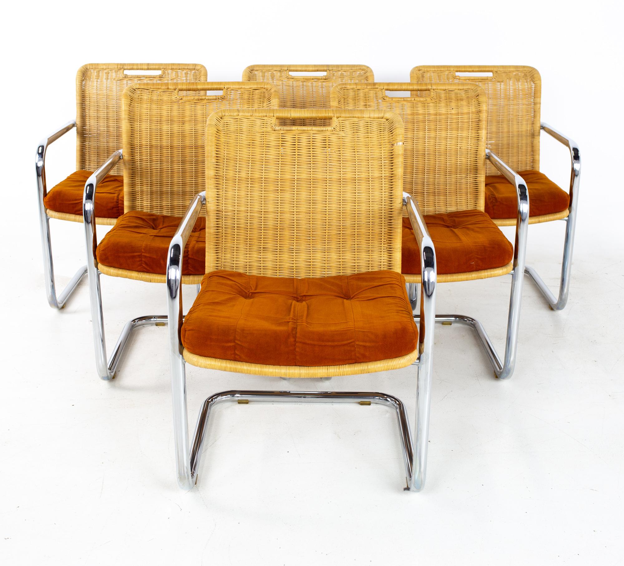 Harvey probber Style chromcraft mid century cane wicker and chrome dining chairs - Set of 6
Each chair measures: 22 wide x 20.5 deep x 33 high, with a seat height of 17 inches, an arm height of 24 inches, and a chair clearance of 22 inches 

All