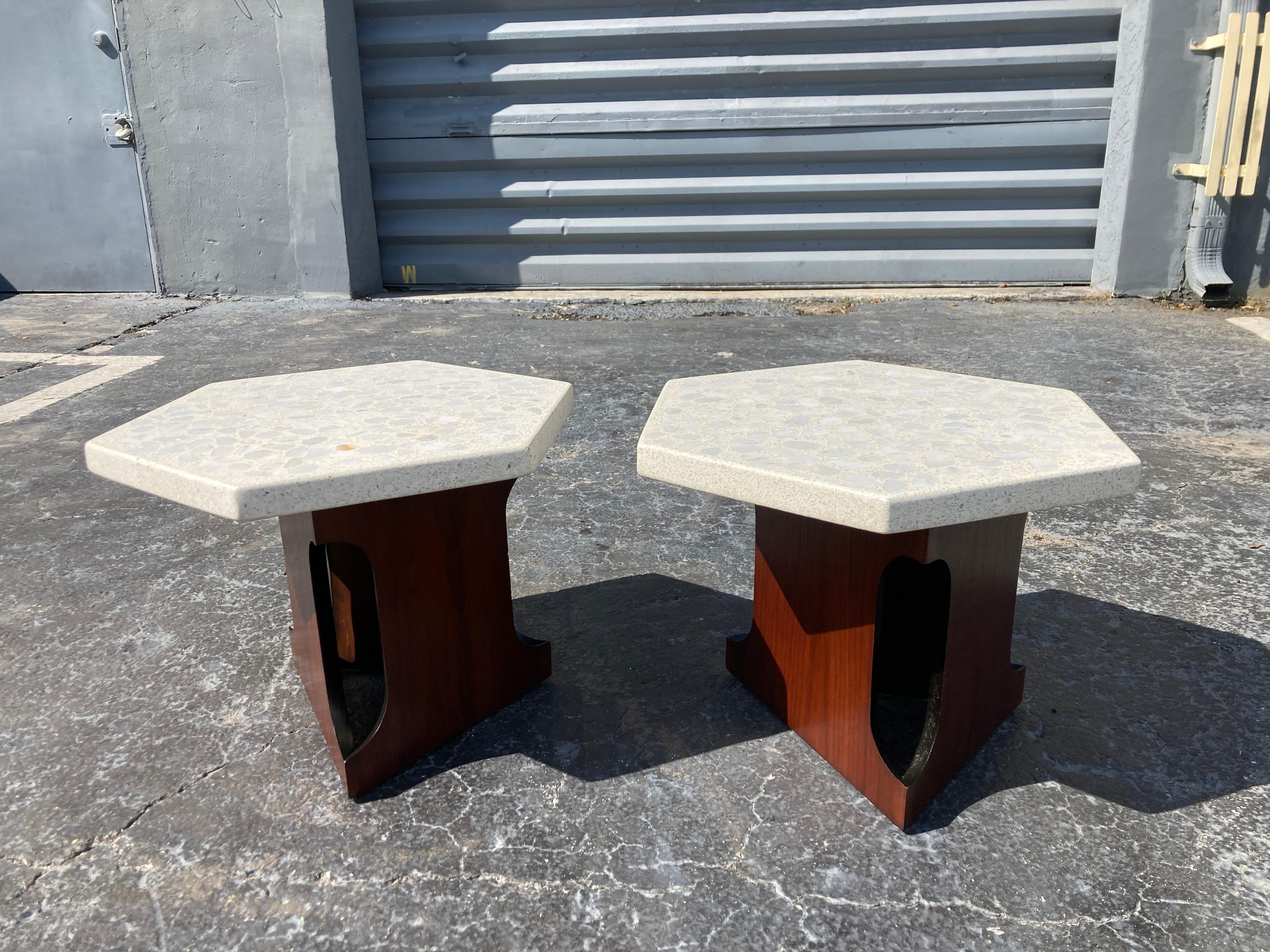 Harvey Probber Style Side Tables with Terazzo Hexagonal Tops and walnut bases with vertical cutouts design details.