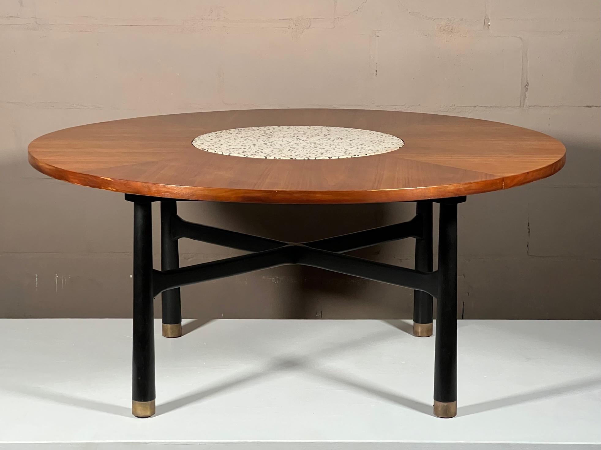 A stylish mid-century coffee or cocktail table-tall at 24