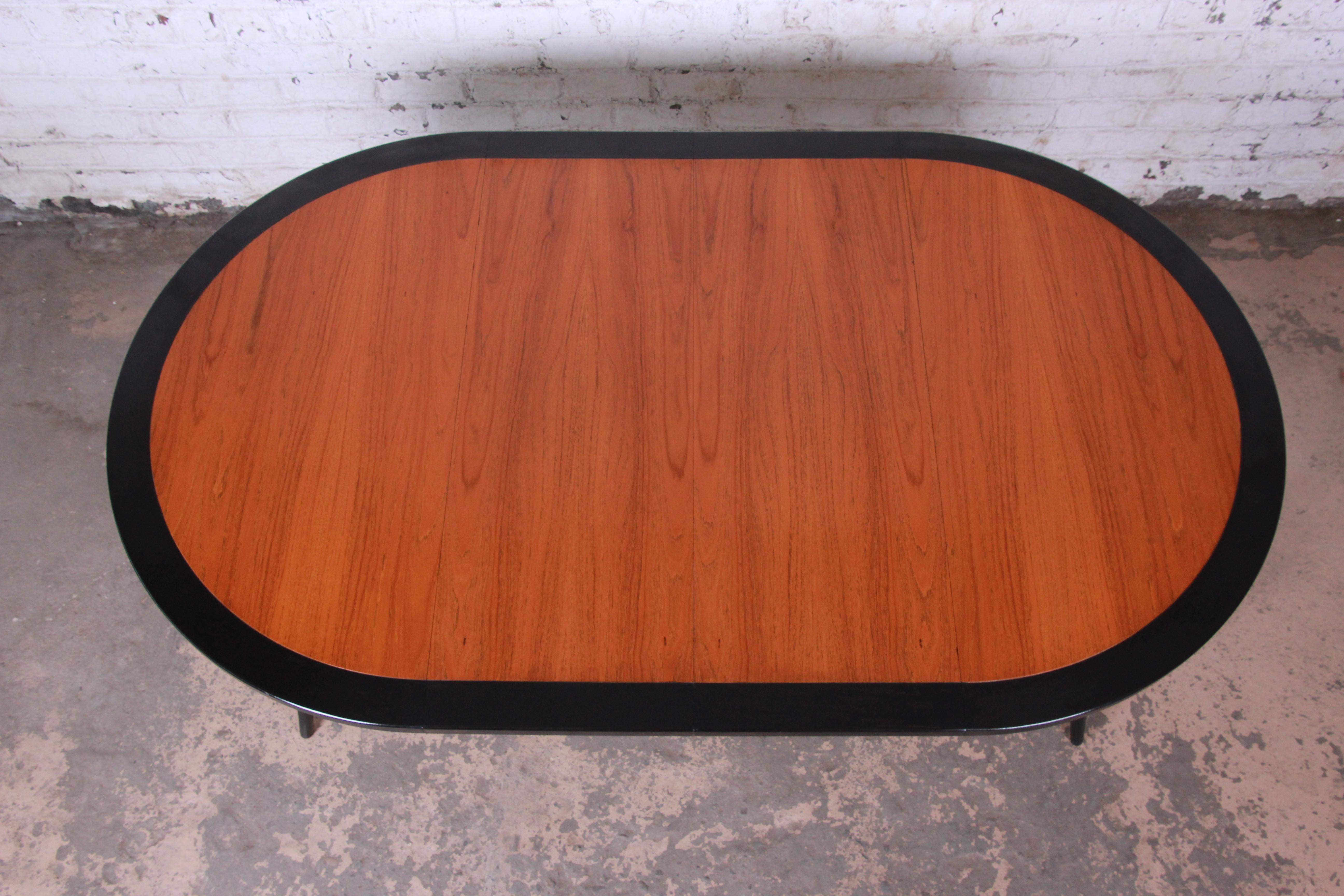 American Harvey Probber Teak and Black Lacquer Saber Leg Extension Dining Table, 1950s