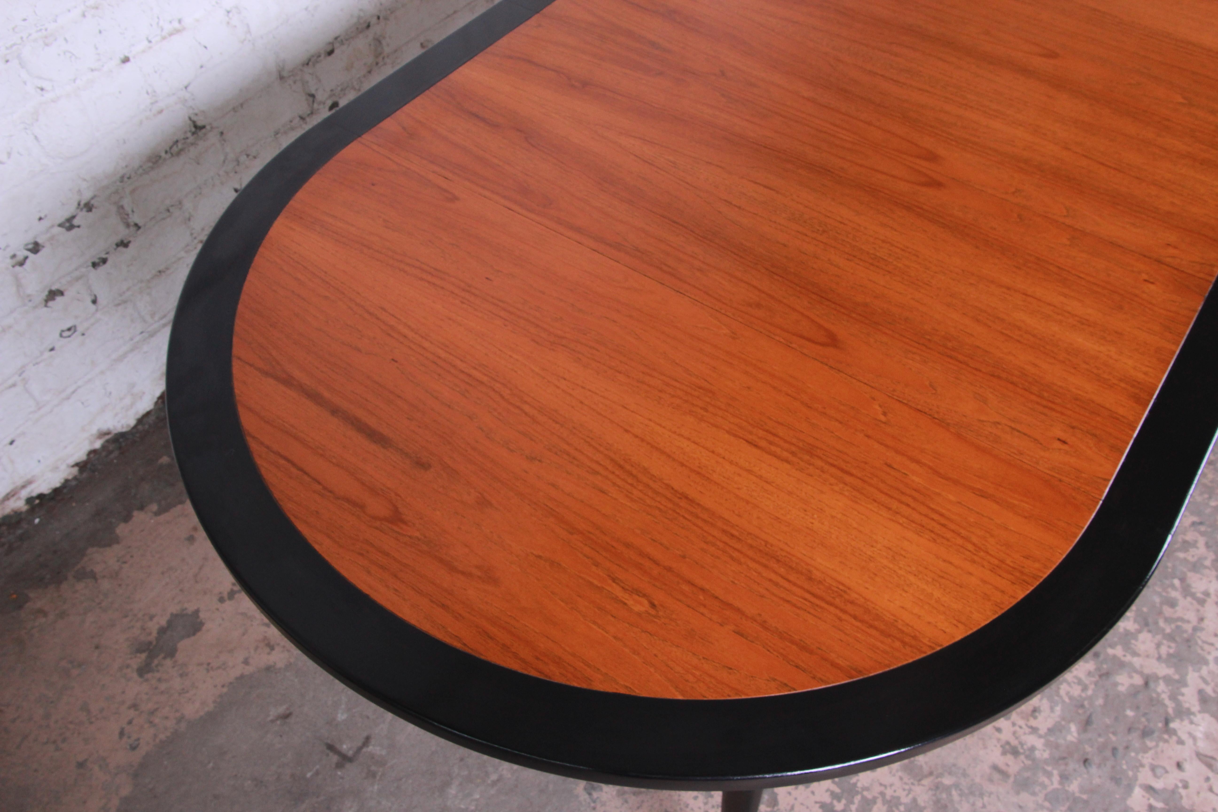 Mid-20th Century Harvey Probber Teak and Black Lacquer Saber Leg Extension Dining Table, 1950s