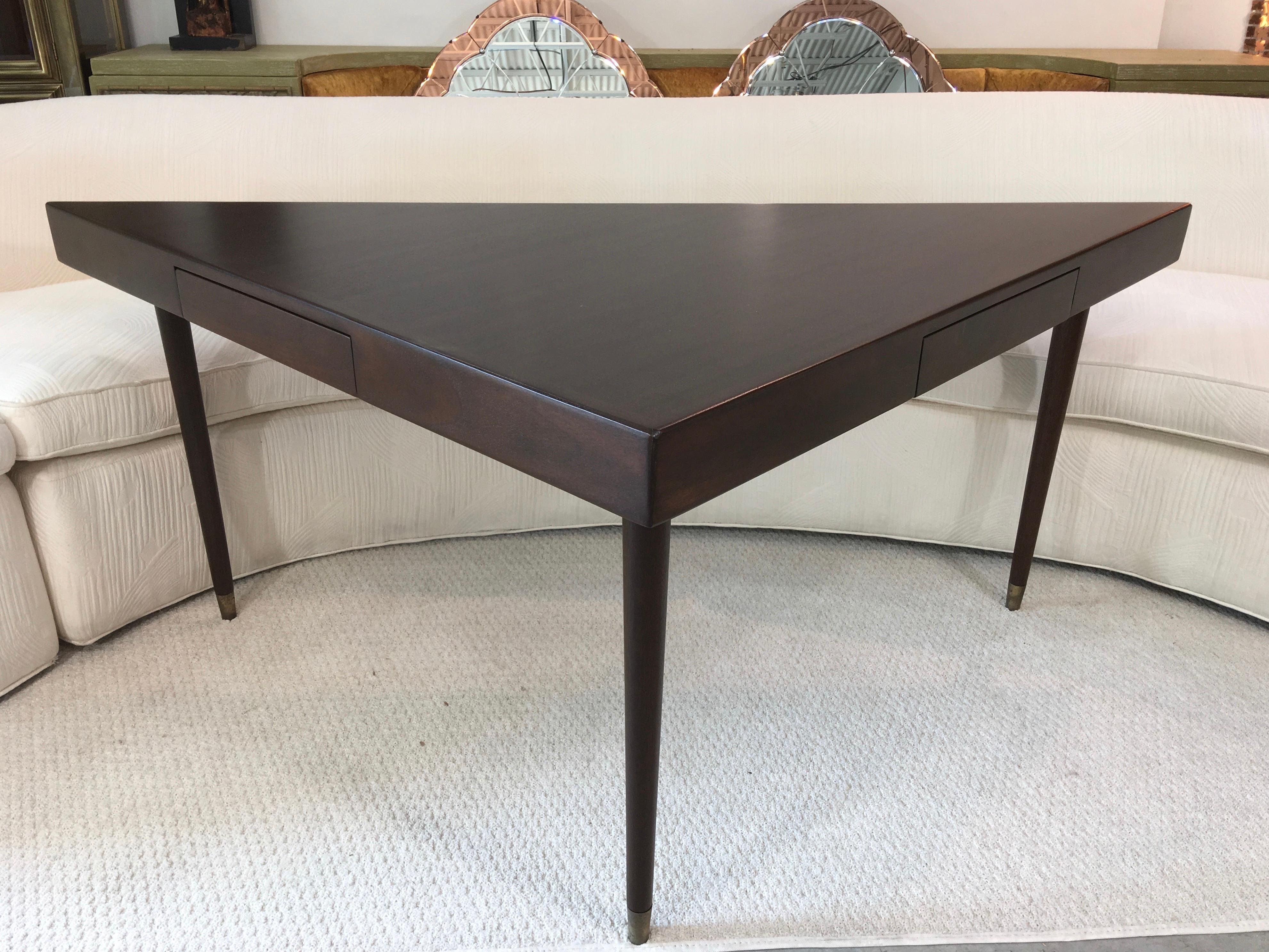 Extremely versatile well balanced triangular shaped table by Harvey Probber. Original vintage mid-1950's. Ideally suited as a corner console table behind one of his famous angular Nuclear Sert modular sofas. Singular enough to stand on its own as a