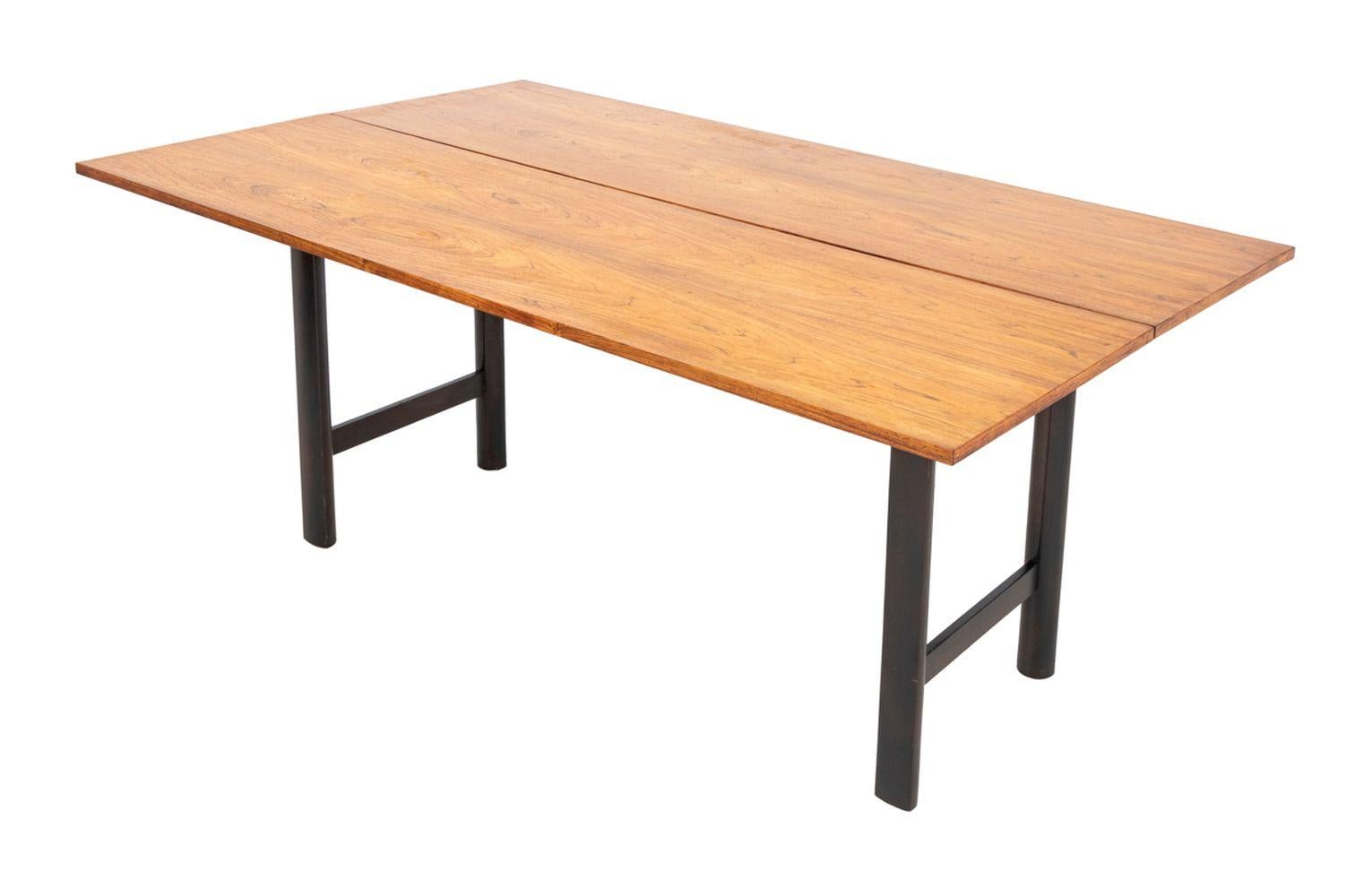 Harvey Probber Walnut Flip-Top Table, upon ebonized supports. Extended: 27.75
