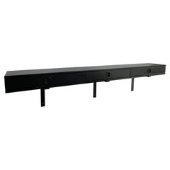 Harvey Probber's Sleek Ebonized Walnut Wall Mounted Floating Console