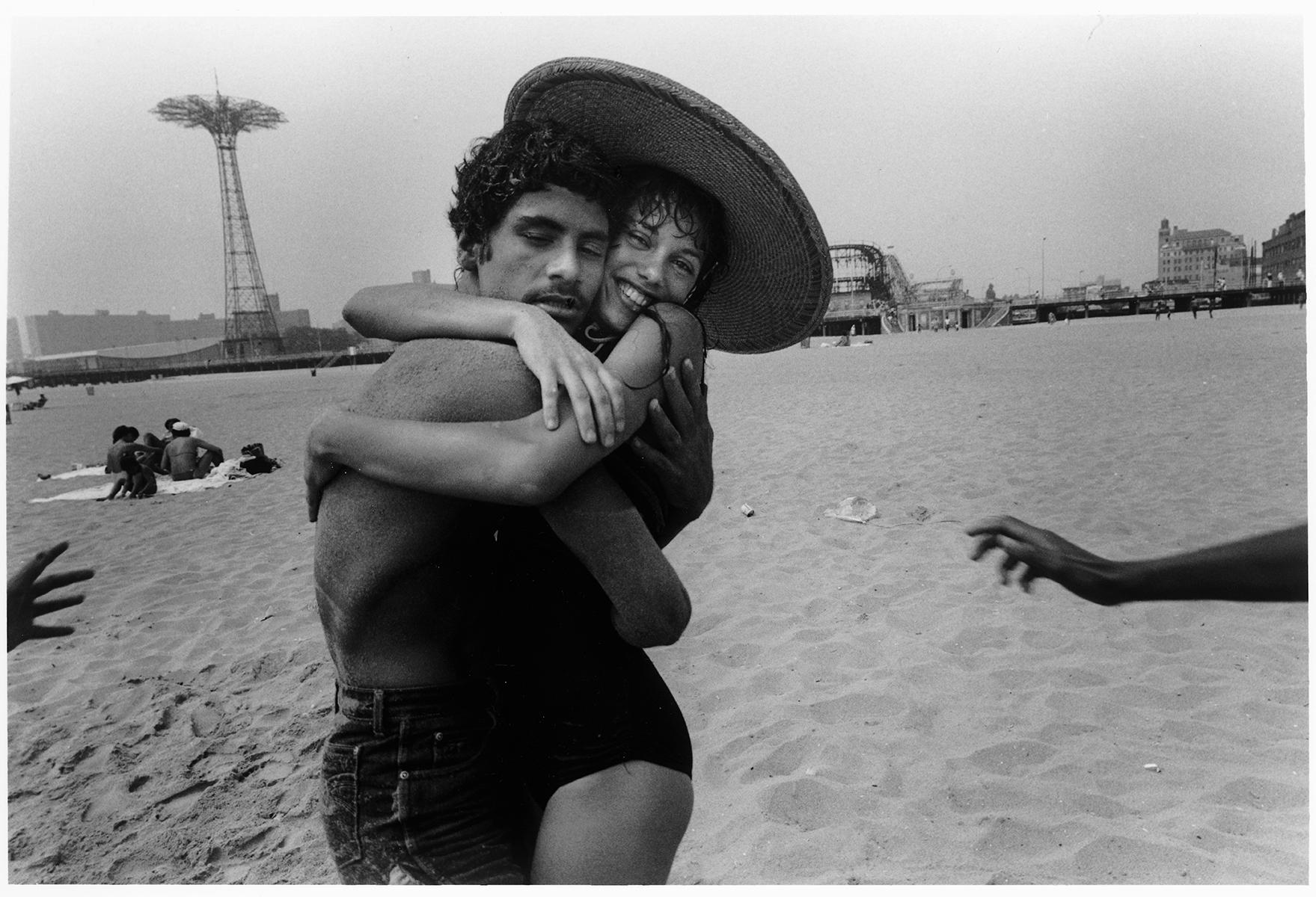 Harvey Stein  Black and White Photograph - The Hug; Closed Eyes and Smile, Love, Cosney Island, beach, New York 